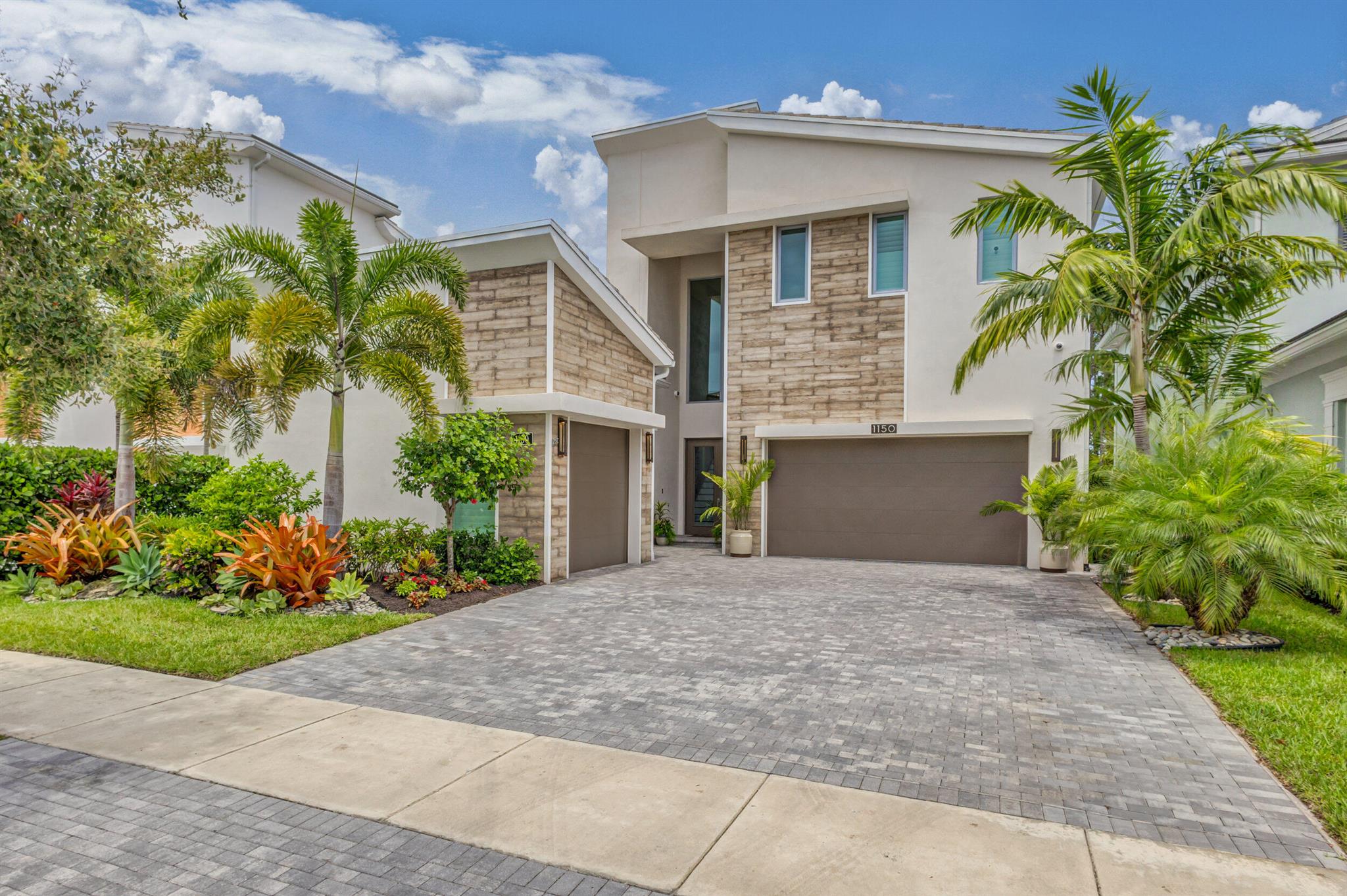 Welcome to your piece of paradise!  This home will rival any model you have ever seen!  As you step in the front door you will fall in love!  This 6 bedroom, 6.5 bath custom Edge C model will blow you away!  To start this home offers a custom gourmet kitchen with top of the line Thermador and GE Monogram appliances, custom bathrooms with every bell and whistle you could imagine, porcelain tile and Kahr wood flooring, aluminum and glass designer staircase, dual laundry rooms, among a complete list of other upgrades that are too long to list!  In addition, there is a laundry list of other items that do not meet the eye initially, such as a full house generator with distribution load, distributed wifi and audio throughout, and even an EV charging station!  Schedule your tour to be amazed!