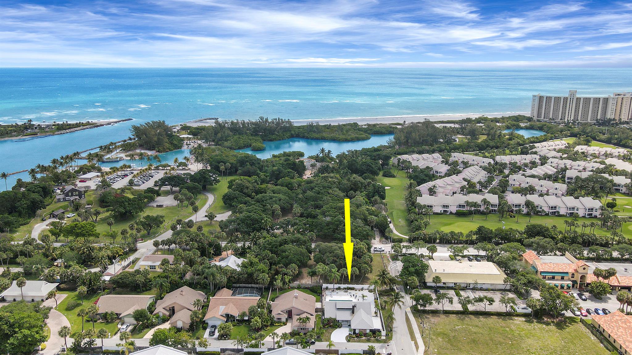 This rare gem in the heart of Jupiter presents a remarkable opportunity to make your own. This home is a true find. Situated in one of Jupiter's most coveted locations, it stands out as one of the few single-family residences that offers convenient beach access through the historic Dubois Park situated in your back yard. Nestled on a private street with only five other single-family homes, it offers an exclusive living experience. A coveted corner lot, this property comes complete with a private pool and a side fence for your boat. Designed with a split floor plan offering 3 beds, 2 baths and a 2 car garage. This prime location offers the luxury of strolling distance to Jupiter's dining and shops including Square Grouper, Guanabanas, Blueline Paddle, Lucky Shuck,1000 North and more.