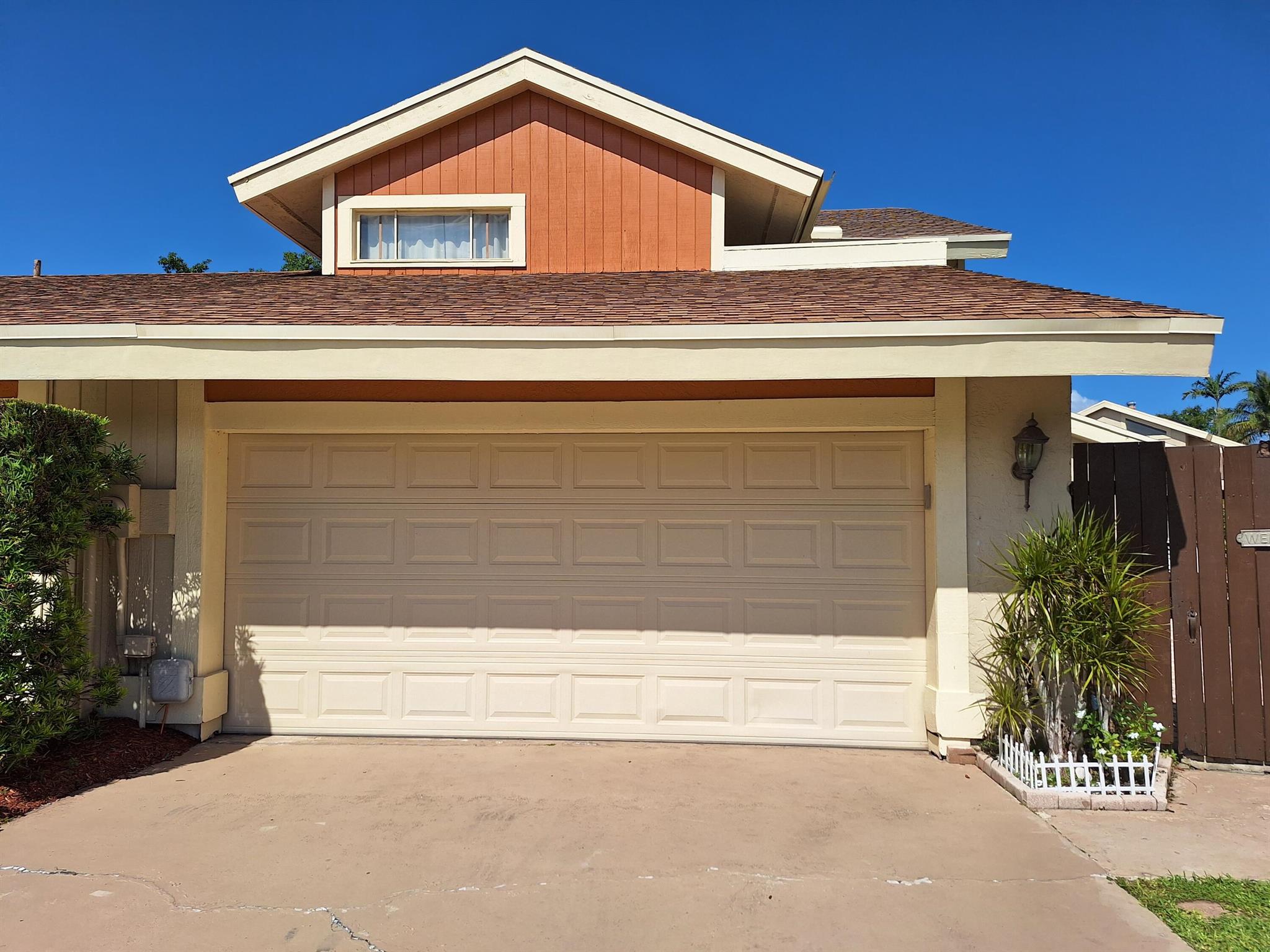 Come experience this private oasis in the hidden gem community of Sierra Del Mar.  This 3 bedroom, 2.1 bath pool home is tucked away on a cul-de-sac street, and boasts a completely remodeled kitchen. Other features include a bonus 2nd floor loft area, restored Spanish tile, outdoor paver tiles, and many other upgrades throughout the home.   Sierra Del Mar community is walking distance to multiple religious facilities, Publix, Winn-Dixie, restaurants, and has a beautiful lake park with a walking track. The community also has one of the lowest HOA fees in Boca Raton, and a large community pool with covered area perfect for family gatherings.