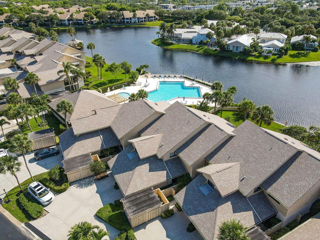 Beautiful waterfront views from this well maintained condo.  Gorgeous flooring spans the majority of this quaint unit.  Located in Waterbend at Johnathan's Landing, this 2 bedroom / 2 bathroom condo provides a great central location for those looking to live in a gated golf community in Jupiter.