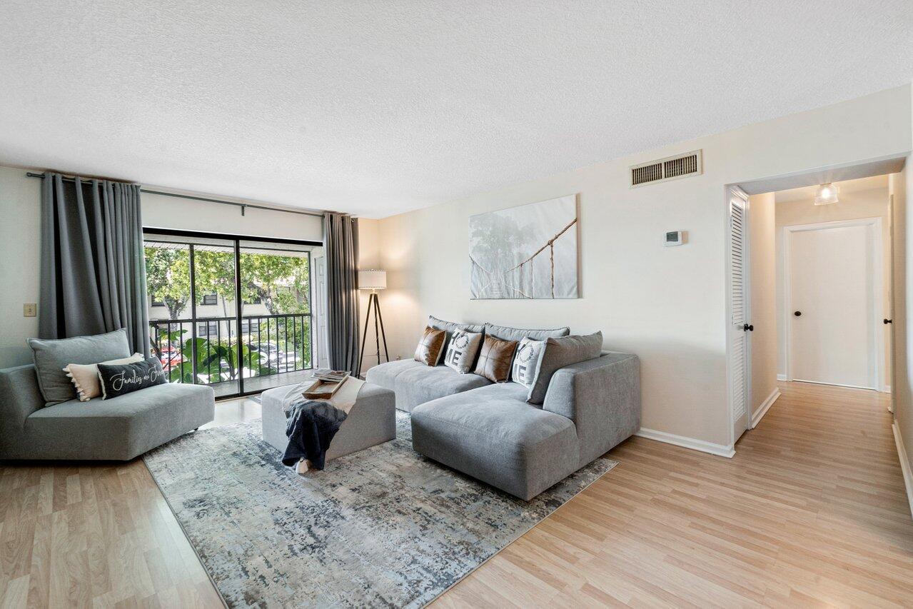 Enjoy comfortable living in this spacious, UPDATED condo located walking distance to the pool in Bent Tree Gardens, an all age community. This 2 bedroom, 2 bathroom offers a NEWER AC, plenty of space for entertaining with a living room, dining area and a screen enclosed patio. This dream kitchen includes newer white kitchen cabinets, newer granite countertops and newer appliances. Primary retreat features a walk-in closet and a renovated en-suite bath. An open floor plan, neutral tile and laminate flooring and an abundance of natural light complete this home. Bent Tree provides first class amenities that includes a clubhouse, fitness center, gathering room, billiards and a resort style pool. Located close to shopping, dining, entertainment, major highways and airports.
