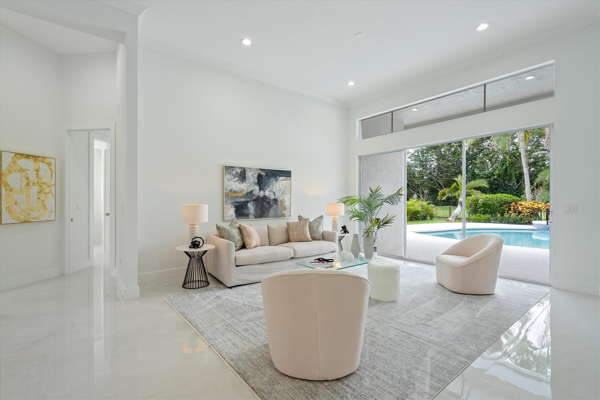 Stylish and newly renovated, modern, bright open one-story floor plan, 4 bdrm 3.5 ba, plus 3 car garage with serene private water and garden views located in Ballenisles Country Club. Clean lines, chic, light filled one of a kind with porcelain floors and quartzite countertops, new appliances, LED recessed lighting, new light fixtures, freshly painted inside and out, new AC's, water heater, 5/2018 roof, built-in closets and many more updates in this exceptional home. The outdoor areas offer tranquil water views, a secluded oasis surrounded by tropical landscaping, inviting pool and spa, perfect for relaxing or entertaining. The coveted neighborhood of Bermuda Bay offers spacious properties with plenty of privacy. Equity Membership required. Enjoy the lifestyle at exclusive Ballenisles Country Club with renovated facilities, 3 spectacular golf courses, state of the art practice range, tennis courts, spa, aquatics center, fitness center, walking and biking, beautiful clubhouse, with a variety of dining options, year-round social events and much more.

