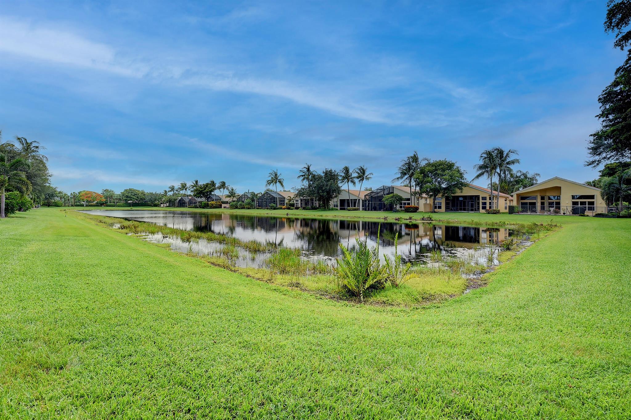 Beautiful Lakefront 3 BR 2 BA 2 GA Home, with spacious great room & extended lanai great for entertaining.This sought after Adriatic model is in move-in condition with vaulted & volume ceilings featuring designer light fixtures.There is tile in the main areas & wood laminate in the bedrooms. The primary bedroom has a fitted walk-in closet, with a separate soaking tub, walk-in shower & duals sinks.The eat-in kitchen is spacious & neutral with granite counters & plenty of storage.  Air Conditioner is approx.  12/2020. There is a tankless water heater. Buyer pays 1X fee $2,270 at closing. Buyer to verify all information herein. Maintenance includes triple net, lawn, exterior paint, alarm, WiFi, SHO & HBO. All measurements are approximate Valencia Palms is a Non-Equity Community. You will Enjoy the Country Club Lifestyle Without Paying the Equity Membership Fees.

Spectacular Renovated Multi-Million Dollar Clubhouse.

Stunning Lobby as you enter the Clubhouse with very Comfortable Seating. A Great Place to Meet New and Old Friends.

Valencia Palms has 6 Har Tru Lit Tennis Courts (Very Active Tennis Community) with a Wonderful Tennis Pro. Also there are Two Bocce Courts and Two Pickleball Courts which is also very Active and a Half Basketball Court.

Beautiful Grand Ballroom with a Dance Floor, Raised Stage, Drop
Down Screens, Separate Dressing Room, Special Lighting &amp; Sound Proofing enhanced by very Comfortable Seating to Enjoy the Great Entertainment.

You will Enjoy the Resort Style Swimming Pool, Resistance Pool
&amp; Whirlpool Spa, Shaded Cabanas, Men's and Woman's Locker Rooms with Steam Rooms &amp; Showers.

Lovely Cafe For Breakfast &amp; Lunch. You can Dine Inside the
Cafe or Outside in a Screened Area Overlooking the Beautiful Pool. Waitress Service with a smile.
You can Dine Outside under the Umbrellas for your pleasure.

You are able to use your debit card at Reuven's restaurant
5 minutes away. (I will explain this to you)

First Class Fitness Center with an Aerobics Room offering Great Classes at a minimum fee.

There are three card rooms, Billiard Room, Conference Room and Arts &amp; Craft Room.

There are Many Clubs for you to Join so you can Meet New Friends.

There is a Walking, Jogging &amp; Bicycle Path &amp; Children's Splash Pad.

Valencia Palms is Centrally Located. Very Convenient to Food Shopping, West Palm Beach Airport, Florida Turnpike, Boca Raton
Town Center Mall, and many well known Boutiques and
Fabulous Restaurants. Also Convenient to Doctors, Hospitals. Not Far From the BEACH, Movie Theaters, Bowling Alley, and Downtown Delray where you have a choice of Fabulous Restaurants and Shopping.

Westchester Golf &amp; Country Club is a few minutes away and it is Open to the Public.

Look forward to meeting you and showing this beautiful home to you