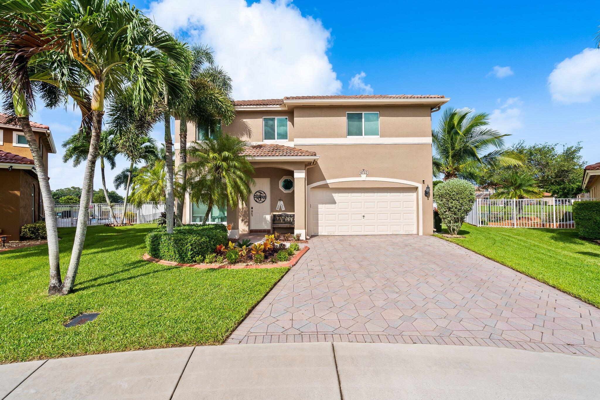 ABSOLUTELY STUNNING! Welcome home to this beautifully renovated two story 4 bedroom / 2.5 bathroom home located within the highly sought after community of Banyan Trails in fabulous Coconut Creek. Notable features include, brand new roof currently in process, impact glass windows throughout, newly updated custom kitchen with high-end pearl white GE Cafe appliances, quartz countertops, gorgeous shaker wood cabinetry, amazing backsplash, new modern light fixtures/fans, updated bathrooms with designer vanities in master bath, brand new high gloss porcelain tile on first floor/l and upstairs, laminate flooring in all bedrooms, designer laundry room (located on second floor) has brand new GE washer/dryer, newer AC, and garage has custom storage lift and epoxy flooring. (Click more for info) Enjoy family gatherings in the oversized backyard while overlooking the spectacular lake view and natural habitat of Sabal Pines Park. There is plenty of room for your own pool on this expanded lot, plus animal lovers can enjoy the custom built wash station conveniently located on the screened in patio! Community offers 2 pools, clubhouse, low HOA and more. This home has it all. Do not miss your chance to own this home, make an appointment today! 



Walking distance to, parks, schools, and conveniently located just minutes to major highways including Sawgrass Expressway and the Florida Turnpike. Ideal location within close proximity to the Promenade at Coconut Creek, an epicenter of shopping, movie theatre, fine dining, and entertainment. No wonder Coconut Creek was Spotlighted as one of the "Best Cities to Live in America" by Money Magazine, and "Top Ten Places to Live in Florida" by Movoto and NerdWallet!