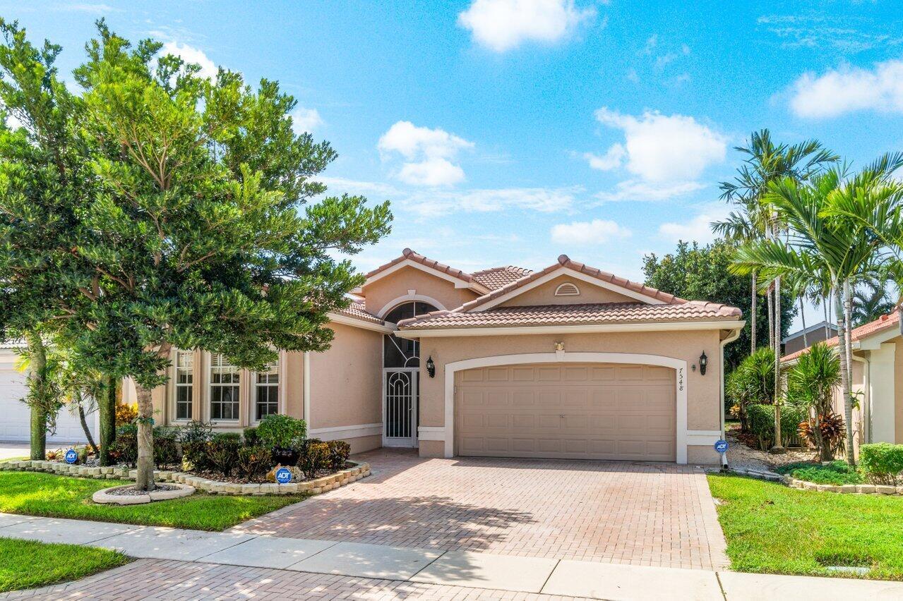 Gorgeous sought after Mediterranean model  home in one of the most desirable communities in Boynton Beach. This home has a NEW ROOF, Jan 2023, Tube Skylights and high hats throughout, modern kitchen, granite counters, whole house water filtration and reverse osmosis in kitchen,. Incredible natural light, huge closets, generator hook up, and a resort style clubhouse with amenities galore in the manned, gated community of Valencia Lakes with it's Bistro, 2 heated pools, tennis, pickle ball, jacuzzi, Theater & Full time Social Director. Come and see it!
