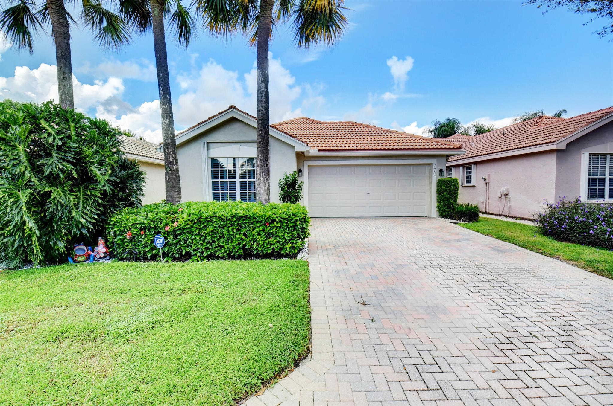 MAJESTIC MODEL (2 BR + DEN) WITH BEAUTIFUL LAKE VIEWS.  DEN CAN BE CONVERTED INTO 3RD BEDROOM. VAULTED CEILINGS IN MAIN LIVING AREAS. FLOORS TILES ON THE DIAGONAL. PLANTATION SHUTTERS IN LIVING ROOM, DINING ROOM AND PRIMARY BEDROOM. TRAY CEILING, WALK-IN CLOSET AND WATER  VIEWS IN THE PRIMARY BEDROOM.  LIVING ROOM HAS TELESCOPIC DOORS LEADING OUT TO SCREENED IN LANAI OVERLOOKING THE LAKE. GARAGE HAS PEDESTRIAN DOOR LEADING OUT TO BACK YARD, PULL DOWN ATTIC STAIRS, AND LOTS OF STORAGE. VALENCIA FALLS IS AN ACTIVE 55+ COMMUNITY WITH A CLUBHOUSE, CAFE, POOL, FITNESS CENTER, TENNIS, PICKLE BALL, BOCCE, SHOWS, CARDS, ART, GOLF GROUPS, CARDS AND SO MUCH MORE.  COME LIVE THE VALENCIA LIFESTYLE,ALL MEASUREMENTS DEEMED ACCURATE AND SHOULD BE INDEPENDENTLY VERIFIED. CLUBHOUSE RENOVATION 2024.
