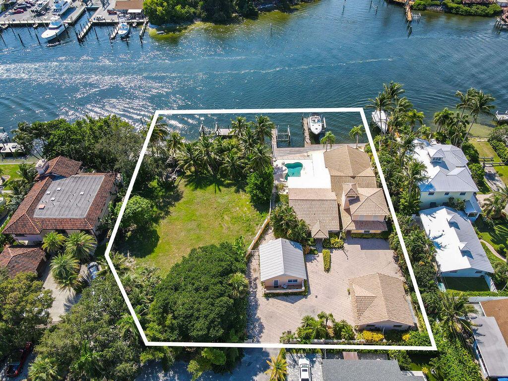 A private sanctuary is being offered at this double-lot investment opportunity comprising 2103 + 2105 Cove Lane, directly on the Intracoastal Waterway with over 204 feet of waterfrontage. This prestigious and highly coveted location in North Palm Beach is just shy of an acre and is zoned for multi-family, allowing a wealth of possibilities for either a luxury estate or an income-producing multi-family complex. This amount of land and waterfront, the unique zoning opportunities and the prime location positions investors for a variety of high-return building options. 3 docks and 2 existing boat lifts - (16,000LBS &amp; 12,000LBS) or dock can be reconfigured to host a large yacht. No wake zone, no HOA, no membership required and water and sewer already on the property.  This listing includes two parcels- 2105 Cove Lane (.4104 acres) and 2103 Cove Lane (.3488 acres). Conveniently located near first class shopping and dining, major highways, Palm Beach International Airport, breathtaking Jupiter or Juno Beaches and only 20 minutes to either Jupiter or Palm Beach Inlets by boat!