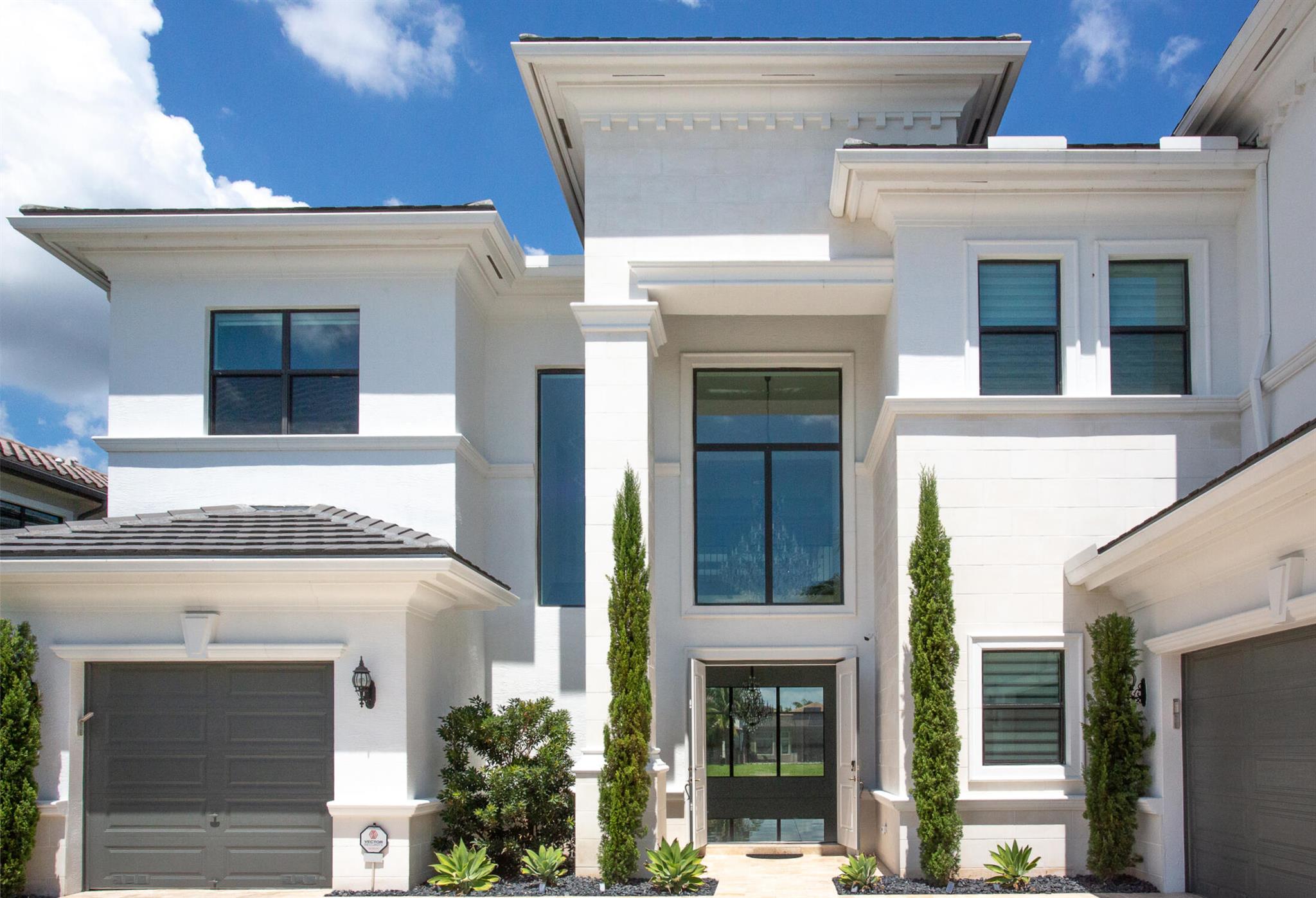 Prestigious Palermo Model from Costal Collection: 7br / 7bath / 6,171 LSF/ 4 garages/ Heated Saltwater Pool with 3 Badu Jets, Deck jets, Bubblers situated on corner lot with private LAKE view. Many high-end upgrades thru the house including Gourmet kitchen with deluxe appliances. Two guest BRs with full BATHs on 1st floor. Master suite on 2nd floor offers an incredible waterfront view from wrap-around balcony. One of the bedrooms on 2nd floor is converted into Spa with Finnish sauna. Multiple crystal chandeliers ( Schonbek and Restoration Hardware) elevate the beauty of the house with a look of elegance and striking opulence. Porcelain tile &amp; engineered hardwood floor. 2nd floor loft area equipped with large screen &amp; movie projector &amp; built-in electric fireplace. Two Laundry rooms, upstairs &amp; downstairs. Summer outdoor kitchen with grill , and much more. "SEVEN BRIDGES" upscale community has No Country-club fees, and offers impressive array of world-class amenities that can rival with the finest resorts. It offers endless ways to spend your leisure time. The expansive 30,000 sq. ft. clubhouse has it all and more. Enjoy the ultimate South Florida luxury lifestyle!