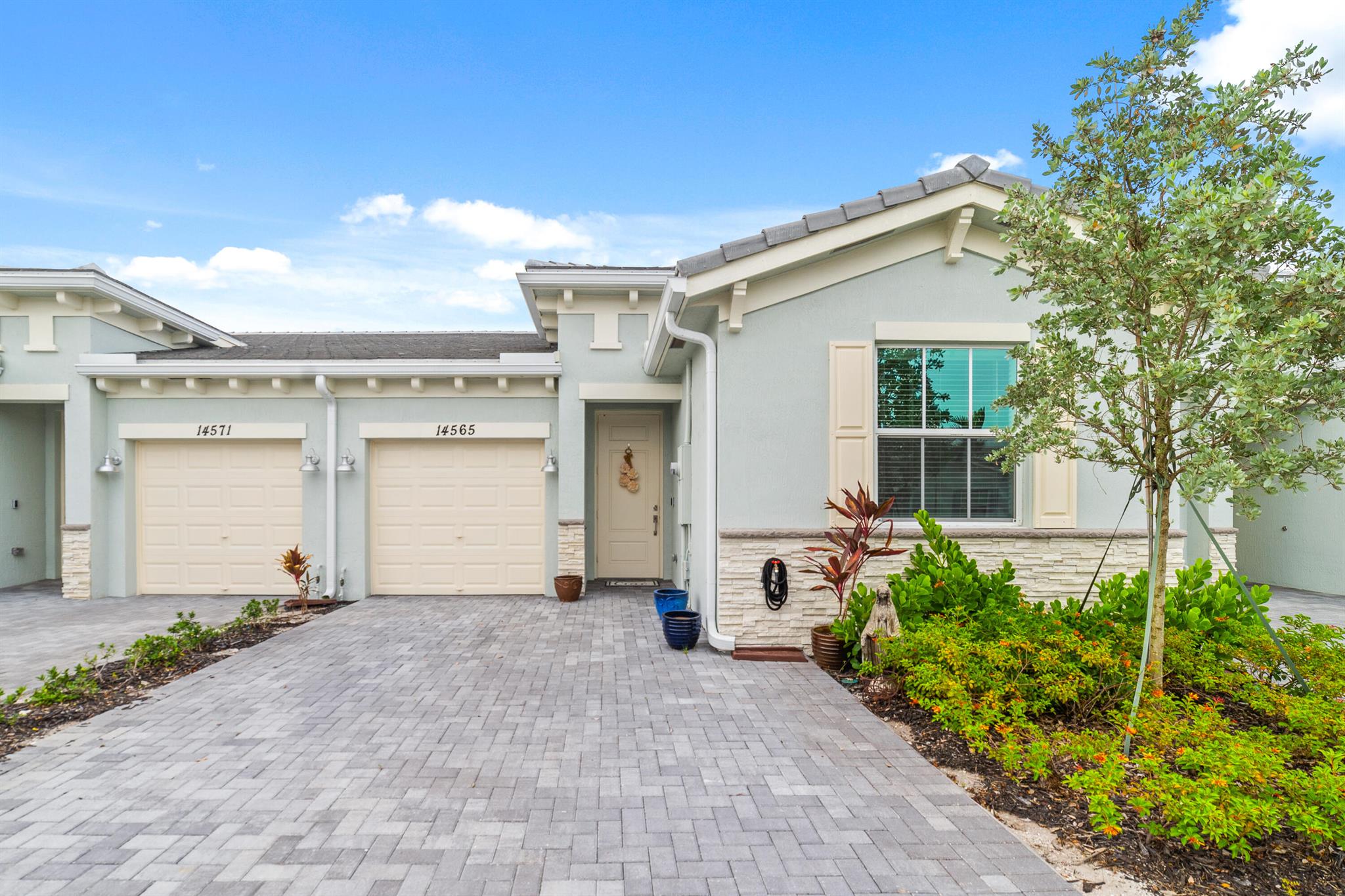 Step into the modern comfort of this beautiful 2 bedroom, 2 bathroom home in the new, coveted Avalon Trails development in the heart of Delray Beach! This gorgeous villa was built in 2022 by Lennar Homes. It features wood-like tile, recessed lighting, hurricane resistant impact windows, sliders and doors. The kitchen is equipped with stunning quartz countertops, stainless steel appliances, grey shaker cabinets and a pantry closet. The primary bedroom offers a generous walk-in closet. The en-suite bathroom has dual sinks with quartz counters and a shower. There is a tub in the guest bathroom. The laundry room features a full size washer and dryer. Relax on the extended, paved and covered patio. Avalon Trails at Villages of Oreole offers its residents access to a clubhouse, cafe, fitness center, entertainment theatre, pools, tennis, pickle ball courts and more! It won't take you long to get to the lively and trendy Atlantic Avenue in downtown Delray Beach featuring many amazing restaurants, Starbucks, boutique shops and galleries, library and Merritt Park that is perfect for outdoor activities. The home is about 7 short miles from the beach. All measurements are approximate. Check out the 3D virtual walkthrough.