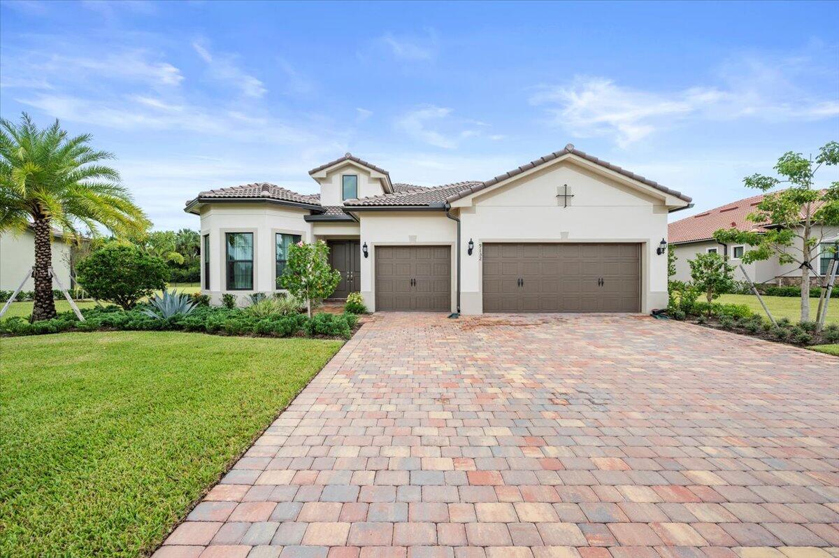 This elegant Oversized single story 3 bed/3.5 bath plus office home with extended 3 car garage is the epitome of luxury living in Palm Beach Gardens. Upgrades include an extra 4 ft deep extension in the 3 car garage, complete water filtration system, pool bath, utility sinks in both the laundry and garage. This Stonewater model in Ancient Tree combines the convenience of modern amenities with the charm of a gated community. It's an opportunity to live in a meticulously designed and upgraded property that's both comfortable and stylish, all while being close to everything you need and right by a championship golf course. Don't miss the chance to enjoy the best of Florida living! Property Overview:

Model: The house is a barely lived-in Stonewater model, which is renowned for its spacious and comfortable design.
Upgrades: The home is thoughtfully upgraded to provide a top-tier living experience. Notable upgrades include a chef's kitchen equipped with top-of-the-line Kitchen Aid appliances, ensuring a culinary enthusiast's dream come true.
Interior Finishes: The interior features upgraded tile and cabinets as well as quartz countertops throughout, creating a sleek and elegant ambiance in every room.
Garage: One of the standout features of this home is the extra 4 feet deep 3-car garage, providing ample space for both parking and additional storage.
Bathrooms: For added convenience, a cabana bath is available, making outdoor activities a breeze. 
Lot Size: The house sits on an oversized lot, offering ample space for outdoor activities, landscaping, or even the potential for a future pool.
Location: The location is truly convenient, right next door to Avenir, it has easy access to shopping, restaurants, and Florida's Turnpike, making it an ideal hub for all your daily needs. 
Golf Course: This property is a golfer's paradise, situated adjacent to the Palm Beach Gardens Sandhill Crane Champion Golf Course. The best part is that no membership is required, and the golf course is open to the public, offering you the chance to enjoy a world-class golfing experience right in your backyard.