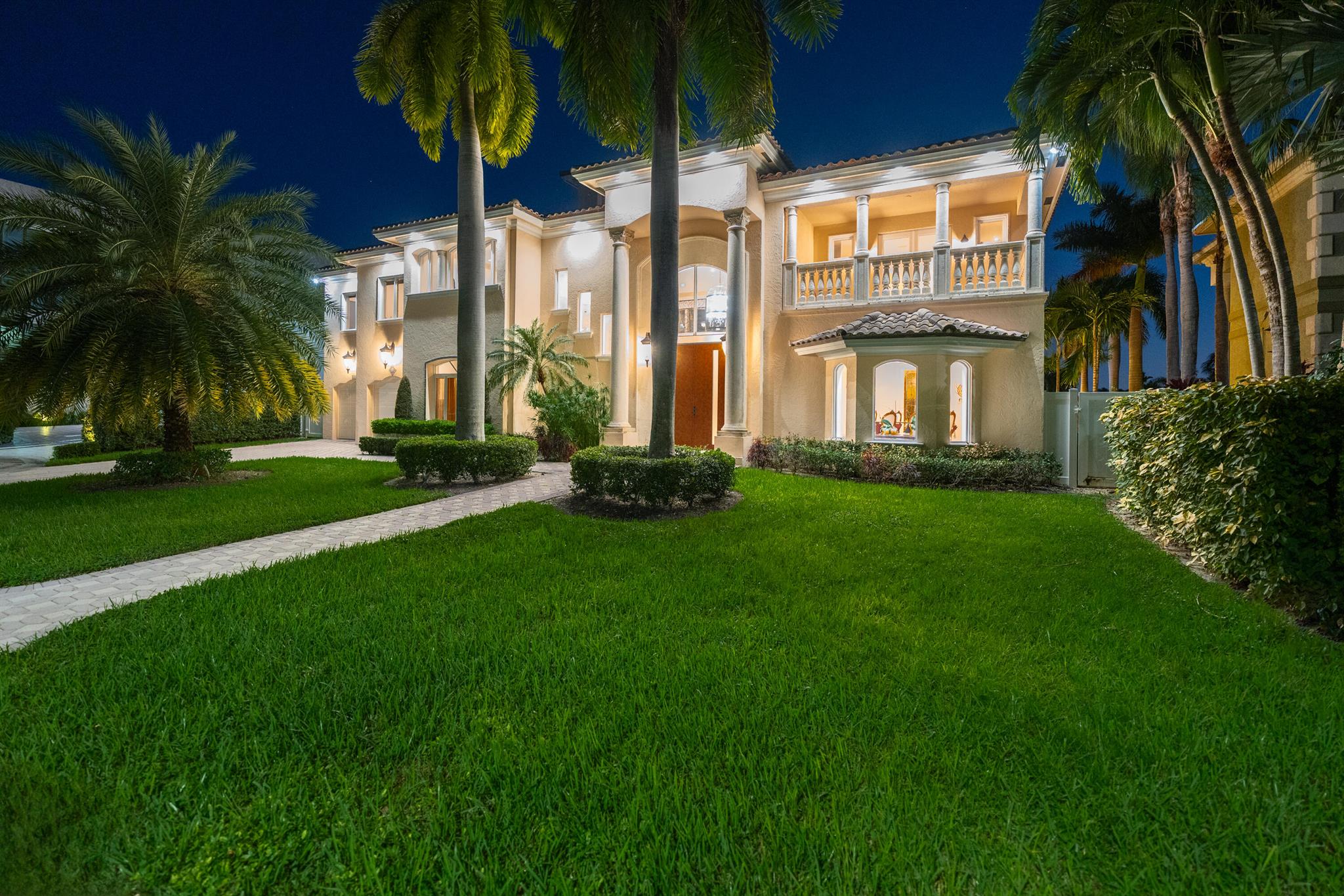 A remarkable waterfront estate one lot from intracoastal waterway, ideally situated and designed to embrace the ultimate South Florida lifestyle. Featuring 5 beds with ensuite baths plus a powder room, home office, and library, the marble-clad Mediterranean residence showcases a double height great room with 30+ foot vaulted ceilings and a glass wall that opens up to exquisite water views. Incredible natural light throughout, with a thoughtfully curated central living space that includes a built-in bar and fireplace. An open, gourmet kitchen overlooks the water and features custom high-gloss cabinetry, a large island, top-of-the-line appliances including double ovens and dishwashers, plus breakfast nook. The spacious principal bedroom floats above the water, featuring two balconies, a wet bar, walk-in closet and Turkish spa-inspired bath outfitted with a waterfront double whirlpool soaking tub and expansive multi-spray-head steam shower. An expansive outdoor oasis presents a boaters paradise with resort-style ambiance with a heated freshwater pool, covered loggia, 1,000 foot concrete dock, updated seawall and ample space to entertain. Nestled on an oversized lot, additional property features include 3 stairways for privacy and convenience, smart home security, climate and sprinkler system, laundry room, custom stained-glass doors, impact glass, and a 2-car garage fully wired for an electric vehicle. Located in the prestigious The Landings community at the end of a quiet cul-de-sac, proximity to the best Fort Lauderdale has to offer including beaches, dining, shopping and A-rated schools.