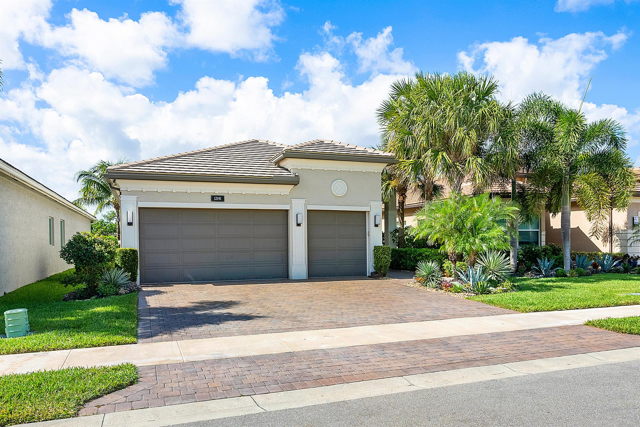 This beautifully appointed Cabernet model (3/3+den+3cg) sits on a prime lakefront lot adjacent to the lake fountain.Features include impact windows,glass entry doors,wood-look porcelain floors,hi-hats,designer light fixtures and window treatments,outfitted closets,upgraded baths,prewire for pool and more!The gourmet kitchen has white wood cabinets,quartz countertops,designer backsplash,double pantry cabinets and all the bells and whistles!There is a separate eating area,snack bar with pendant lights & formal dining room.The great room,with designer built-in,is open to the kitchen.The master suite features a coffered ceiling,two walk-in closets and a luxurious master bath with wood cabinets and quartz counters.You'll love the covered screened porch and open patio area overlooking the lake. Valencia Bay is a premier 55+ lifestyle community featuring a spectacular 33,000 square-foot clubhouse and 8 acre outdoor recreational facility. Endless activities and opportunities for fun abound - there are activities, trips, shows, and clubs of all types. The clubhouse features an expansive foyer and lobby, grand ballroom with raised stage, dance floor and two small bars, three spacious card rooms, Arts and crafts room with kiln, Billiards room/internet, Catering kitchen, Cooking studio, Men's and women's locker rooms with showers, Yoga &amp; exercise studio and separate, fully equipped fitness center. There is a Cafe with indoor/outdoor seating and a large pool bar. There are three pools - a beautiful Resort-style pool with Swimmers' Lap Lanes and Shade Pavilions, Resistance walking pool, Grandchildren's wading pool, and an Outdoor whirlpool spa. There are six har-tru tennis courts with shade pavilions, tennis pro shop, tennis pro, league play, six pickleball courts, pickleball pro and league play, 2 bocce courts, 2 handball courts, half-court  basketball and walking/jogging/biking paths throughout and just outside the community. Valencia Bay is conveniently located near shopping, restaurants, houses of worship and major highways!