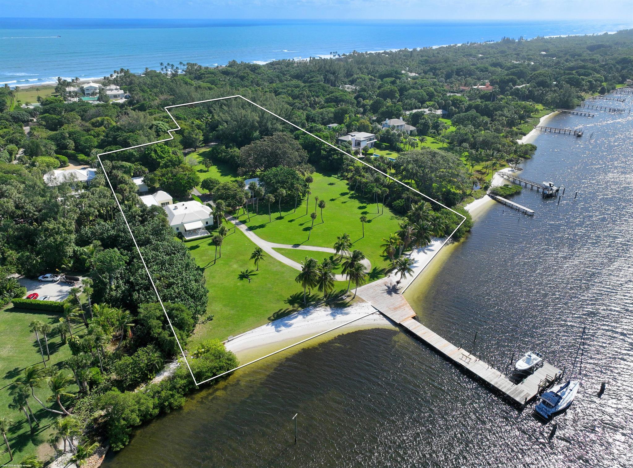 This is a rare opportunity to own one of the premier Intracoastal properties on Jupiter Island. 216 S Beach Rd. encompasses 6.3 acres of prime Jupiter Island land with 338 feet of DIRECT INTRACOASTAL FRONTAGE WITH VIEWS ACROSS TO THE PRESERVE. The maximum allowable floor area of 20,000SQ. FT, would cover a large main house and two additional accessory buildings for living quarters. A large deep water dock with adjacent deck provides ample space for multiple boats, kayaks, wave runners and paddle boards. The perfect private family retreat with wide water unobstructed views.