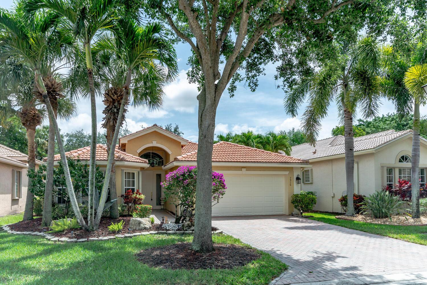 NEW PRICING! Don't miss out on this beautiful home a very private view, perfect for enjoying a cup of coffee on the back lanai or grilling with friends and family. There are 2 bedrooms, 2 bathrooms and a den which could easily serve as a bedroom for guest if needed. This home is beautifully decorated and has many nice and newer features including, an updated kitchen, updated floors, newer hot water heater and air conditioning. This home was painted in 2019 and still looks new. The kitchen is equipped with a nice center island with a raised counter perfect for in kitchen dining as well as a breakfast nook. The laundry room is inside with a full size washer and dryer as well as cabinets. The master bedroom has ample closet space for all of your clothing and storage nee