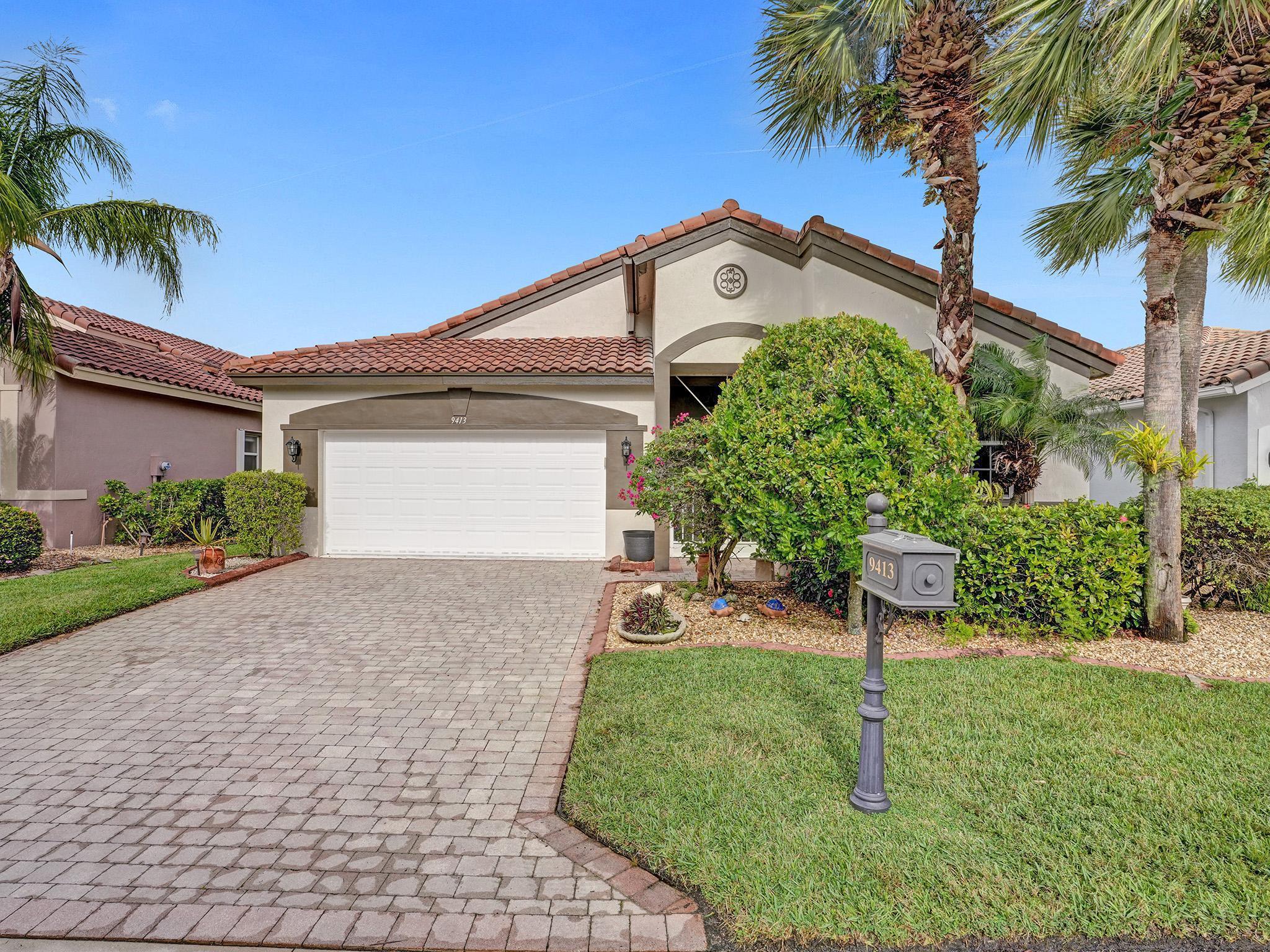 Amazing home in 55+ community Bellagio. Custom Francelli House 3 bedrooms 2 bath home. This home is set on a beautiful lake with gorgeous Lake views from the pool and screened patio with hot tub. Hurricane shutters on all of the windows.Spacious Clean white kitchen refinished with granite countertops, updated appliances in 2020. A/c 2018Hurricane proof oversized front doors. Garage door opener updated 2023.Immaculate Master bedroom includes 2 walk-in-closets with custom build shelves. Build in safe and plenty of storage. Large windows with gorgeous lake views. Master bathroom updated with large roman tub, separate shower, updated vanities. Glass shower door in guest bedroom right off the adjacent room includes updated shower with glass sliding doors.Brand new Water heater 2023.