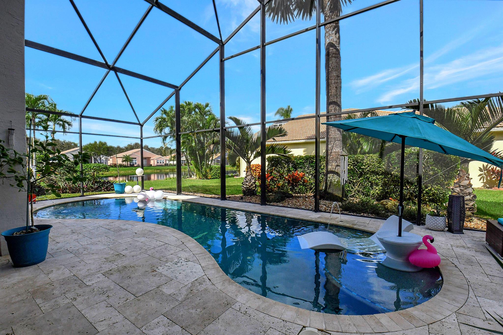 GORGEOUS AVILA MODEL WITH WATER VIEWS & A BEAUTIFUL CUSTOM FREE-FORM, SCREENED-IN, SALT-WATER POOL PLUS HOT TUB.  ACCORDION SHUTTERS, 2 A/C UNITS, 80 GAL HOT WATER HEATER, NEUTRAL TILE ON THE DIAGONAL THROUGHOUT MAIN LIVING AREAS & CUSTOM WINDOW SHADES & LIGHTING FIXTURES THROUGHOUT THE HOME.  KITCHEN HAS VAULTED CEILING, CROWN MOLDING, STAINLESS STEEL APPLIANCES, WHITE & GLASS CABINETS, GRANITE COUNTERTOPS, BREAKFAST NOOK WITH UPDATED LIGHT FIXTURE.  PRIMARY BEDROOM HAS TRAY CEILING, CROWN MOLDING, CUSTOM & RECESSED LIGHTING, DUAL FITTED WALK-IN CLOSETS & DOOR TO THE LANAI.  PRIMARY BATHROOM HAS DUAL SINKS, SEPARATE VANITY, SHOWER WITH FLOOR TO CEILING TILE, BENCH SEAT & FRAMELESS GLASS DOOR.  LIVING ROOM HAS CROWN MOLDING TRANSOM WINDOW & SLIDER TO LANAI.  (SEE MORE) VALENCIA FALLS IS AN ACTIVE 55+ COMMUNITY WITH A 25,000 SQ FT CLUBHOUSE WITH A RESORT STYLE POOL, RESISTANCE POOL, SPA, TENNIS, PICKLEBALL, BOCCE, MULTIPLE CARD ROOMS, FITNESS CENTER, AEROBICS STUDIO, ART/PHOTOGRAPHY STUDIO, GRAND BALLROOM WITH SHOWS THROUGHOUT THE YEAR, CAFE WITH INDOOR AND OUTDOOR DINING, OVER 35 CLUBS AND ORGANIZATIONS TO JOIN AND MUCH, MUCH MORE.  COME EXPERIENCE THE VALENCIA FALLS LIFESTYLE.  ALL MEASUREMENTS ARE DEEMED ACCURATE BUT SHOULD BE INDEPENDENTLY VERIFIED.