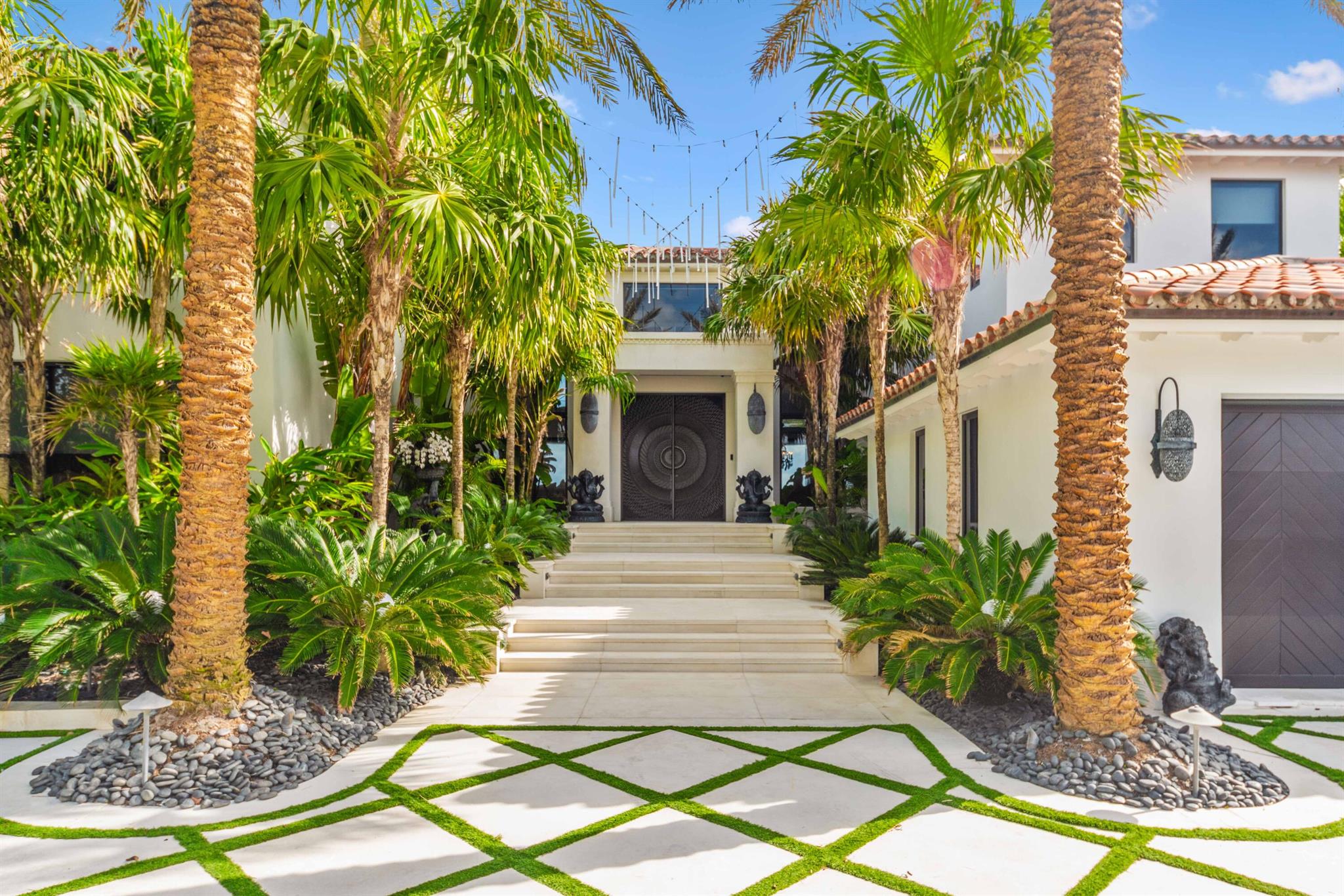 This spectacular direct oceanfront home has been completely and totally renovated from top to bottom, inside and out! Beautiful transitional style eloquence meets the highest quality workmanship and finish level. The recent renovation transformed the style, both exterior and interior, in conjunction with installing new roof, new infinity edge pool, spa & outdoor decking, new floors, new kitchen and all new bathrooms, new & larger window and doors to accentuate the panoramic ocean views, new smart house/Control 4 home automation, new driveway,, new landscaping, new summer kitchen, new whole house generator, and more! Exceptional style, no expense was spared and only the finest materiel's were used. The property sits up on a bluff giving the house great elevation and unmatched ocean vistas!