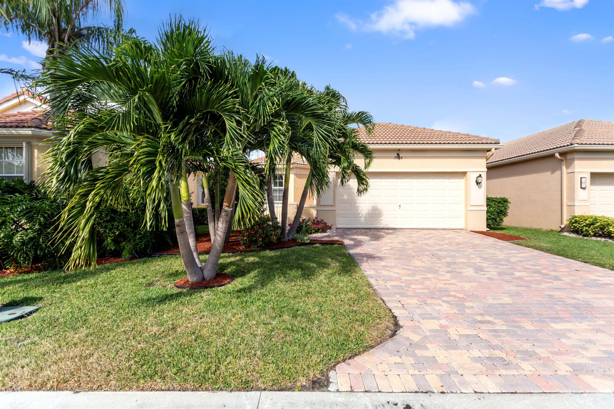 Welcome  to Vizcaya is a Fabulous Gated Resort Style Community! This 2 bedroom 2 bath +den Home has gleaming 18'' ceramic tile flooring,  all new stainless steel appliances, kitchen w/ Shaker-style cabinetry, granite counters , a seated bar.  Livingroom w/vaulted & tray ceilings, Primary bedroom suite newer remolded bathroom, Walkin closet.   Enclosed Lanai offers a spot for additional seating, canal view, dining, and entertaining.  Laundry room with utility sink and cabinetry plus attached double garage, plantation shutters.  Home has full accordion shutters ,  Roof 2002 .  Vizcaya resort-style. Screened Lanai with pavers. Very low HOA fee, includes lawn care, cable and HBO, 24 hour manned gate, 22,000 sq. Ft Clubhouse with Fitness Center, Olympic size pool, Spa, Har Tru Tennis Courts.