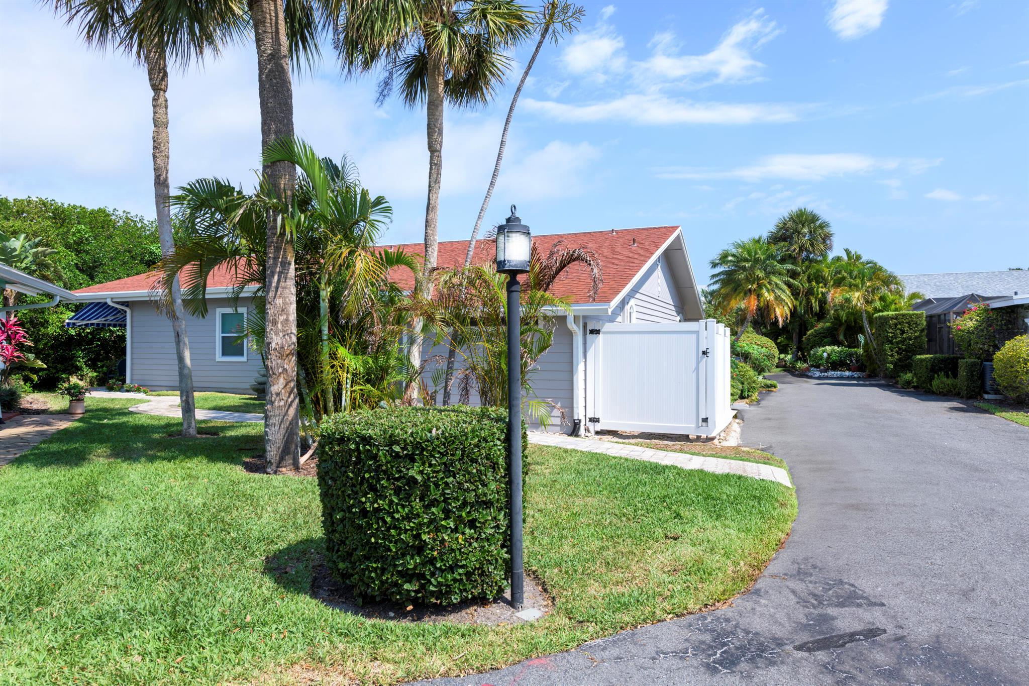 Welcome to the serene Indian River Point situated in the historic and quaint seaside town of Jensen Beach. This charming turnkey home is meticulously prepared to serve as your year-round residence or a seasonal getaway. Additionally, it presents a unique opportunity for Airbnb hosting, boasting generous income potential. Nestled between the mangroves of the Indian River Lagoon and within walking distance to the beach, this community offers an array of amenities, including boating facilities with available slips for rent or purchase, a pool, and tennis courts--all conveniently located along the intracoastal waterway. The property is available with optional furnishings for purchase, providing an effortless transition into your new home. Noteworthy features include a recently