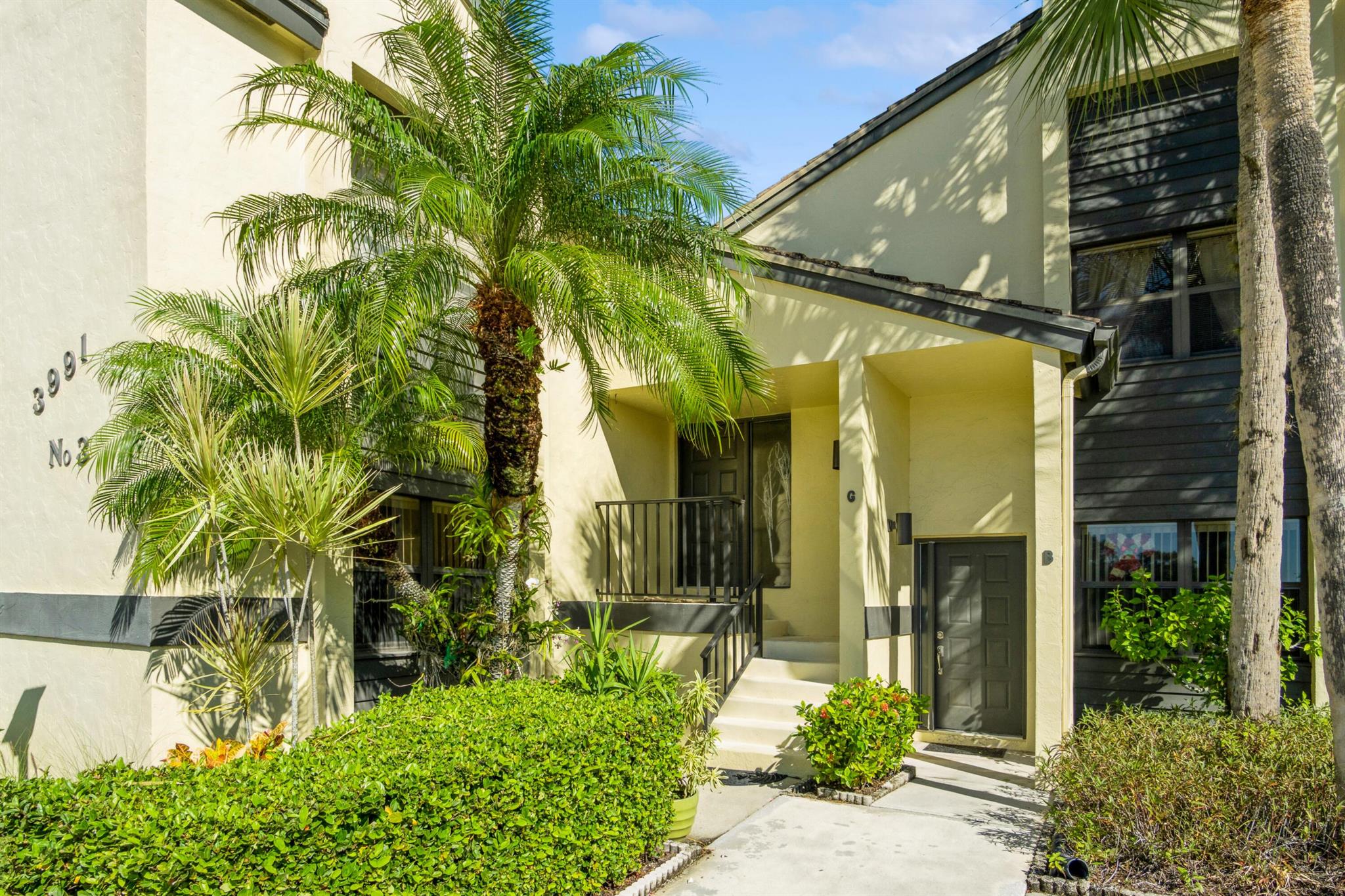 Beautifully maintained condo in the heart of Palm City. This delightful home features a generous 1384 sqft with 2bd, 2ba, a den and a private lanai accessible from both the eat-in kitchen & great room, offering serene, panoramic views. Light & bright with vaulted ceilings and a contemporary split plan, the open kitchen is updated with granite counters, and custom wood cabinets.  Clubhouse Court in Palm City's Martin Downs is a community for all ages, featuring 2 golf courses, a restaurant, and a spa, also offering ''a-rated'' schools, easy access to I-95, the Turnpike, varied restaurants & shopping. Just a short ride to downtown Stuart and beaches.