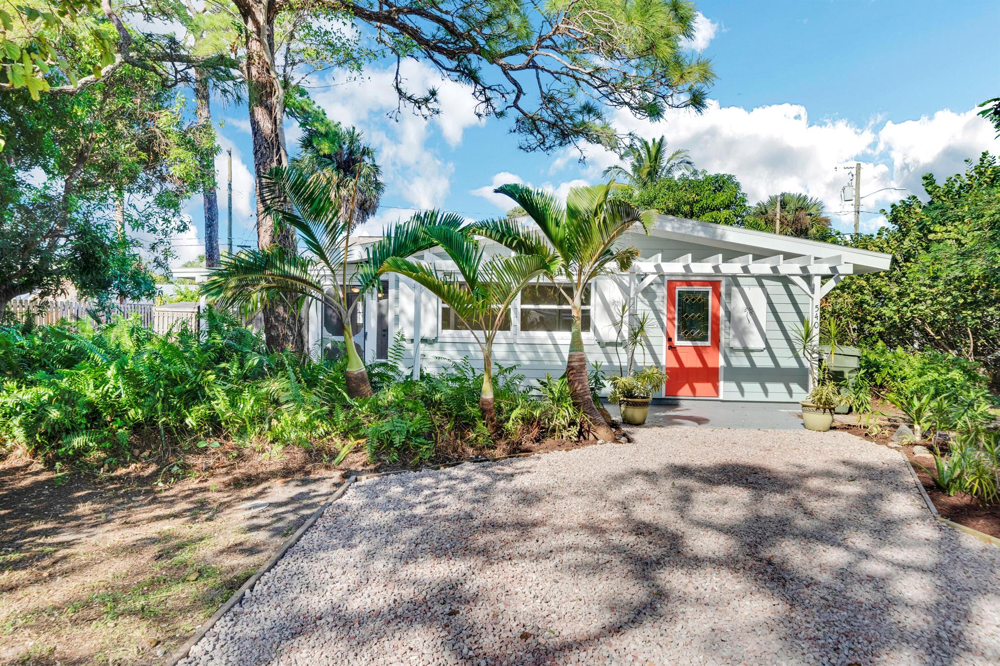 Welcome to your dream home in downtown Stuart! This stunning 4-bedroom, 2-bathroom residence is situated on a spacious corner lot, offering both comfort and style. The property boasts a brand-new roof, ensuring durability and peace of mind for years to come.Step inside to discover a beautifully renovated interior featuring a modern kitchen and bathrooms. The kitchen is a chef's delight, equipped with state-of-the-art appliances, sleek countertops, and ample storage space. The bathrooms have been tastefully updated, exuding contemporary elegance.Enjoy the charm of this ''Cozy Compound,'' where every corner of the home invites relaxation and warmth. The layout is thoughtfully designed to provide both privacy and togetherness, making it an ideal space for families or those who love