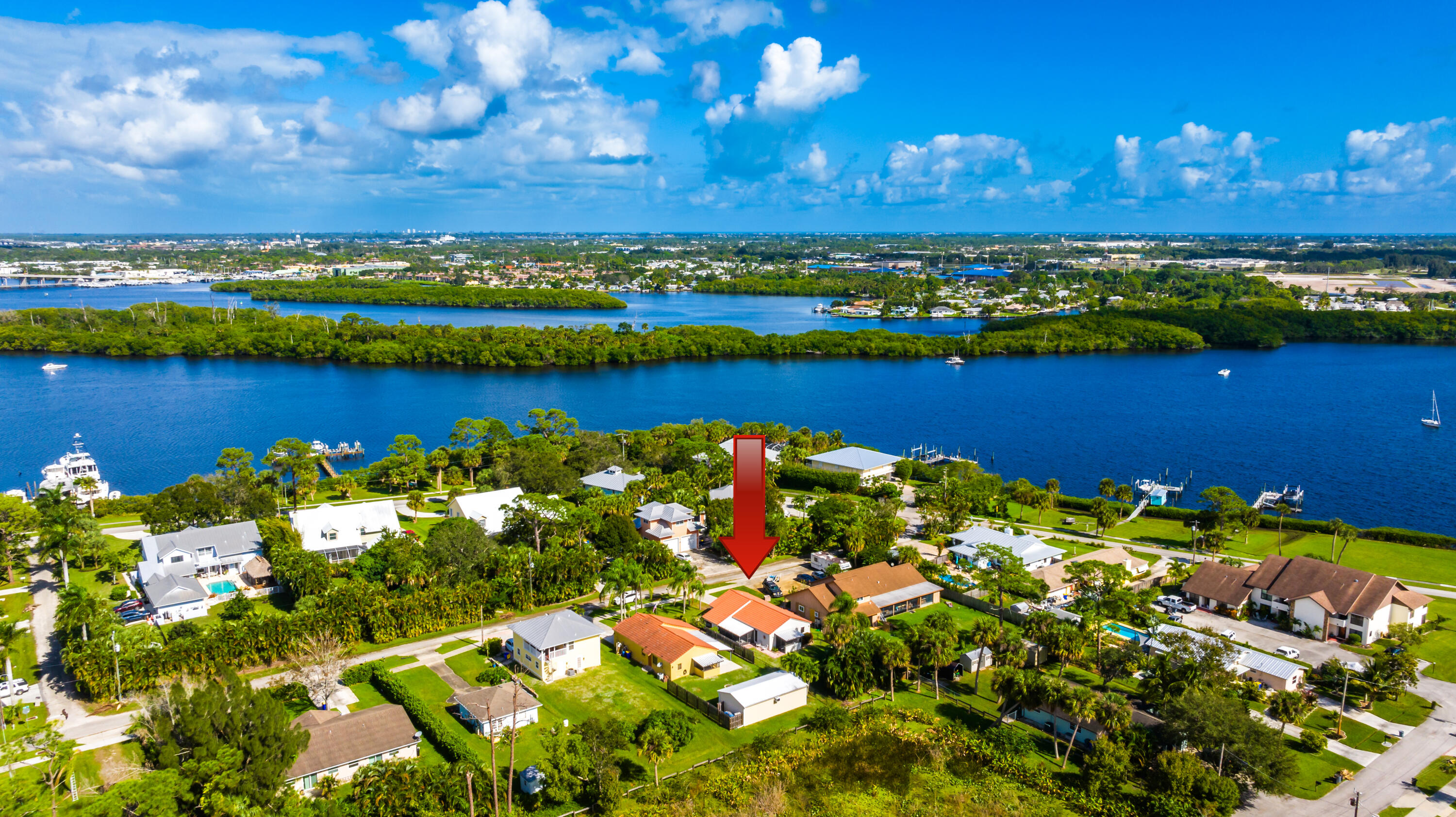 The ideal 2 bedroom, 2 bath home with a 1 car garage and No Homeowner Association. Located in Old Palm City. Split floor plan, Cathedral ceiling. A/C 2021.  HWH 2021. Two screened patios. Completely fenced 2022. Shed. Nature preserve as your back neighbor. Bring your boat. Community boat ramp 1 mile away. Turnpike moments away. Great location.  Furniture negotiable.