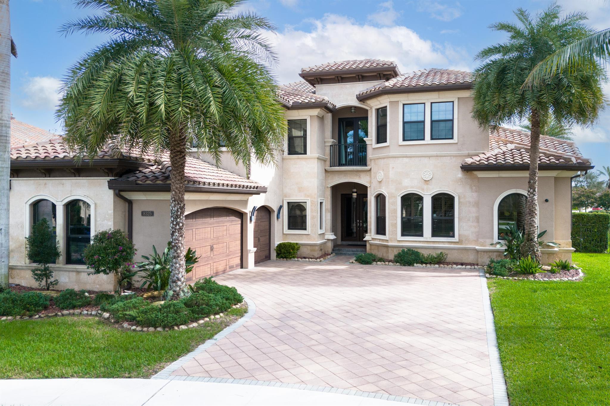 This stunning home features a breathtaking pool and spa, offering serene lake views. The corner lot on a quiet rotunda provides extra privacy and minimal traffic, making it a perfect oasis for relaxation or entertaining.  Step inside to discover upgraded marble flooring that adds an air of elegance throughout the home. The kitchen features high-end appliances including a WOLF range and SUB-ZERO refrigerator. The home is fitted with a whole-house entertainment system that creates an ideal setting for hosting family and friends.  The home is zoned with excellent public schools, close to shopping and dining, and the community offers a resort lifestyle with a pool, clubhouse, fitness center, tennis and pickleball courts, gaming room, card room, splash pad, and more!