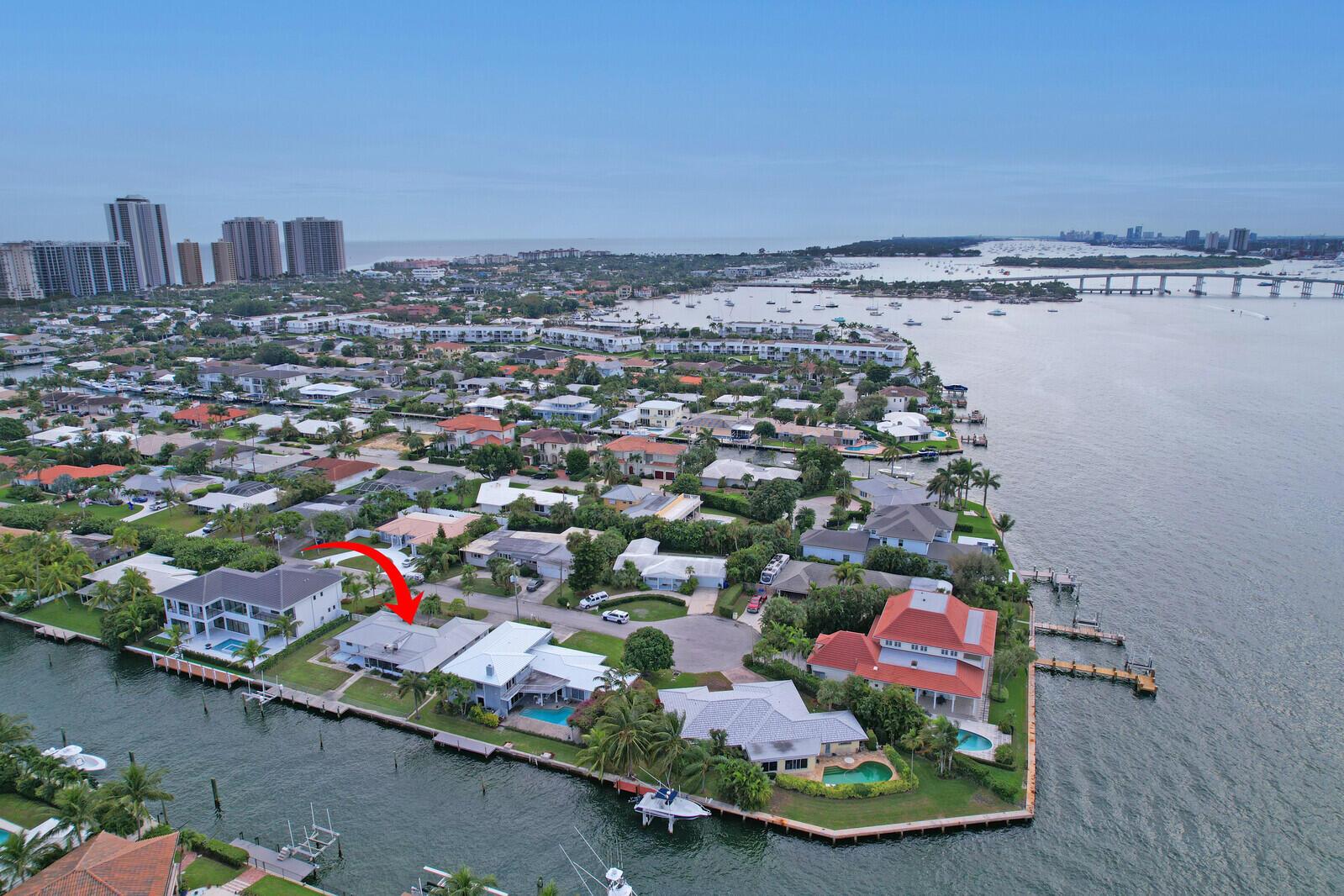 LOCATION LOCATION LOCATION - Ideal opportunity to build on a prime waterfront lot in Palm Beach Isles on beautiful Singer Island Florida.  Close proximity to the Intracoastal waterway, a short boat ride with NO fixed bridges to the Palm Beach Inlet and access to the beautiful Singer Island beach  via neighborhood deeded beach path just across the street make this location an excellent choice.  Build your dream home here and start enjoying a true Florida lifestyle.