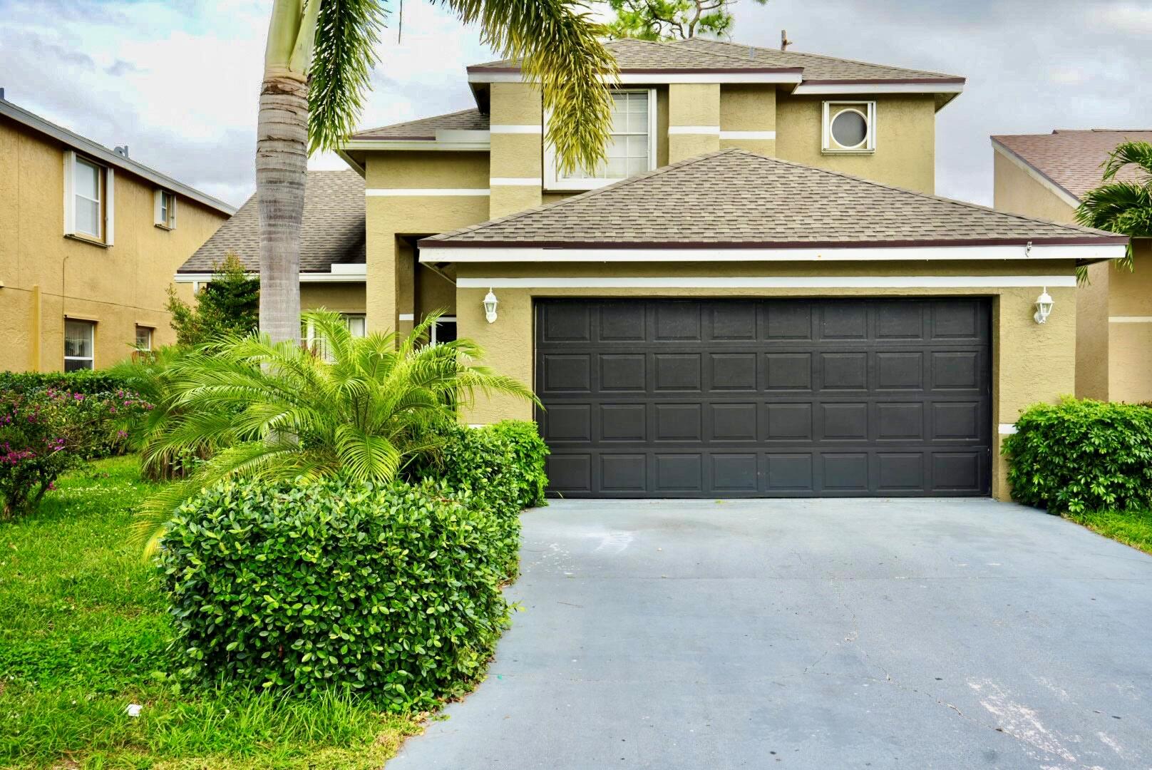 133 Heatherwood Drive, Royal Palm Beach, FL 