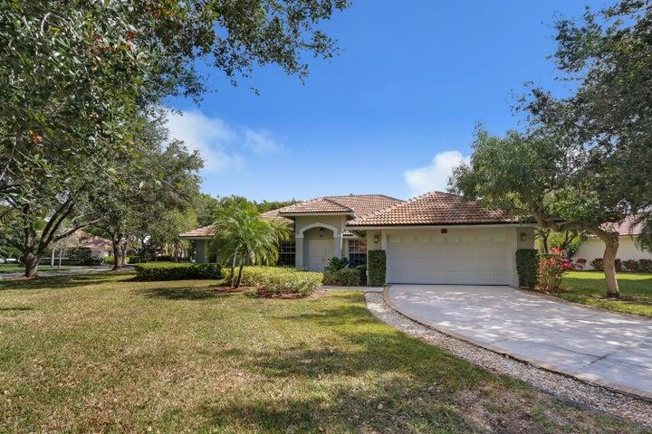 Home has been completely redone from top to bottom. Unique open floor plan great for entertaining. Spanish porcelain tiled floors throughout. Custom kitchen cabinets with stainless appliances. Loads of cabinet space. Brazilian Granite counters. Wine cooler. Volume ceilings with impact glass skylights. Lots of light. Newly renovated bathrooms. Roof replaced in 2012. AC replaced in 2017. Large screened in porch. House is a real gem in move-in condition.