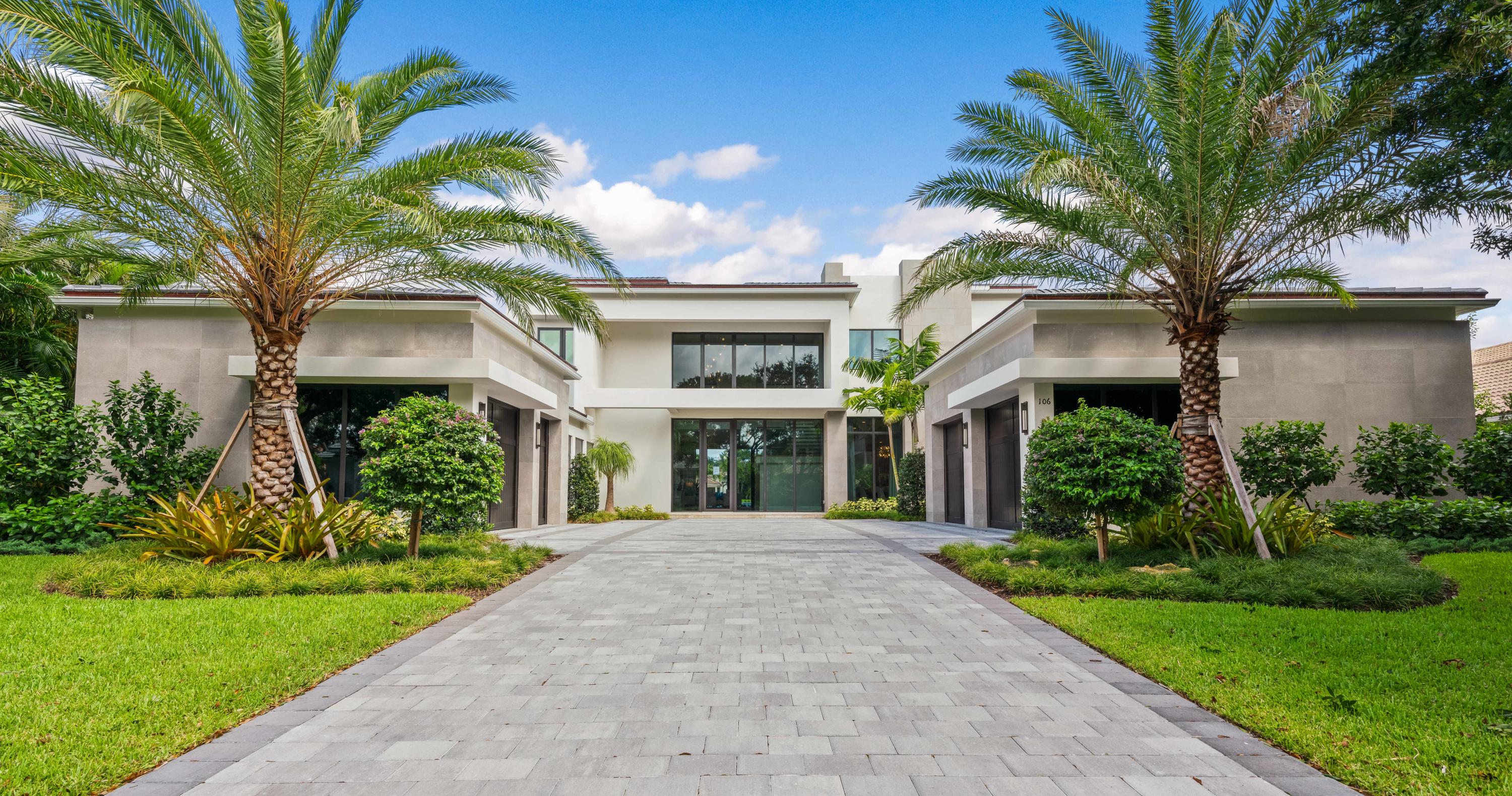 Nestled along the oak canopied street of Quayside in Admirals Cove lies this new construction home ready for occupancy in January 2022. Built by one of the area's top custom home builders, Hasey Construction made sure they paid incredible attention to every detail in this new masterpiece. From the moment you arrive, you will know that this custom waterfront residence is different from others you have seen in your lifetime. The approach is elegant and timeless featuring storefront impact windows and doors, smooth concrete accents and solid wood garage doors. As you enter the foyer of this luxury estate, you'll find natural stone flooring throughout the main living areas, a wood veneered see-through gas fireplace perfectly situated between the formal living... and family room, impeccable ceiling details, and a wall of glass along the back of the home which brings the outside, inside. Off the family room you'll find a gourmet kitchen suitable for a culinary chef. Precision mitered porcelain countertops, Sub Zero &amp; Wolf appliances, fine milled cabinetry and designer plumbing fixtures. Downstairs you will find the master suite along with an enormous waterfront club room and an in-law suite.

The oversized master suite is definitely fit for a king &amp; queen with water and pool views, tremendous natural light, drapery pockets and closets that will be hard to fill, even for the most accomplished shopper. Her master bath will not disappoint featuring white marble floors, free-standing contemporary tub, frameless glass shower, beautiful quartz vanity top, custom cabinetry and an elegant dressing area. His bath is more masculine in appearance, but the fit and finish is second to none.

This custom home is equipped with an elevator, but when you see the craftsmanship of the floating staircase, you may never want to ride. Solid wood treads ensconced in glass and polished metal, the stairs in this custom home are the perfect combination of art and functionality.

Upstairs, both family members and guests will live in the lap of luxury. Featuring an oversized loft, 3 ample guest bedrooms with ensuite baths, walk-in closets, large balconies and water views galore.

If your ship has come in, this is where you will want to keep it. With 110ft of waterfront, a new custom dock will be the main feature outdoors. The dock will have a lounging deck for entertaining, water, electric and room for up to a 80ft yacht. Relax poolside in your custom heated pool and spa featuring automated controls, waterfalls and a sun shelf for splashing about. Can you smell those tomahawk ribeyes cooking on the grill? The outdoor living area provides for a well-appointed summer kitchen, ample room for outdoor furnishings and phantom roll down screens for added comfort. This is the custom home of your dreams and you can have it now!

Listing images are from a previous home built by Hasey Construction and should not be relied upon as the actual photos.