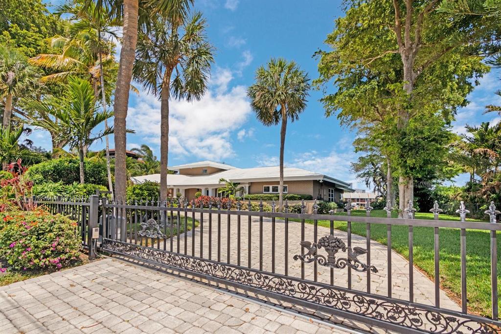 131' DIRECTLY ON THE INTRACOASTAL WATERWAY. OVERSIZED LOT ON COVETED SE 28TH AVE -- 40k# BOAT LIFT. -- gorgeous views from almost every room. Gracious home/Estate Size Lot. Vaulted ceilings, kitchen eating area w/glass slider wall to the pool & I/C. Summer Kitchen/BBQ covered area, huge pool, private yard, gated drive, TWO CAR GARAGE. Premium furnishings. Private master suite w/balcony upstairs, 2nd master down, 3rd bedroom w/bath and 4th bedroom can be den/office/tv room. The 4th bedroom/den/office is located at the front of the home right by the foyer/front door entrance & restroom if clients visit. Spectacular living on the Water. Walk to the beach, nightlife, clubs, shopping & dining. COMPLETE PRIVACY inside this luxurious gated home in multi-million dollar upscale neighborhood.
