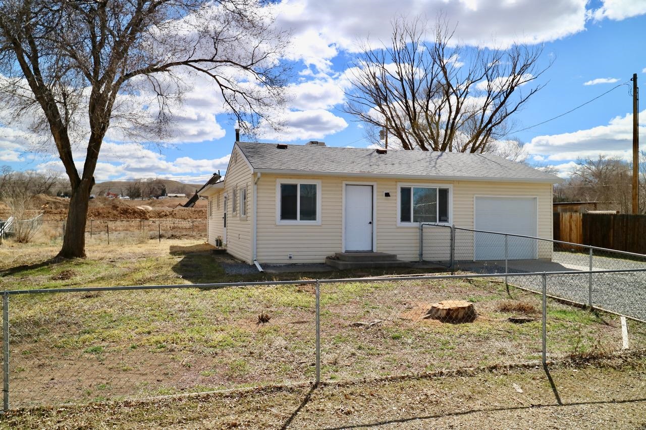Move in ready 3 bedroom, 1 bathroom home in Orchard Mesa.  New paint, water heater and evaporative cooler.  Large lot is fenced and great for pets. RV parking with 30 amp outlet. Close to Hwy 50, Chipeta Pines Golf, & Much more.  Storage and wood shed are included.
