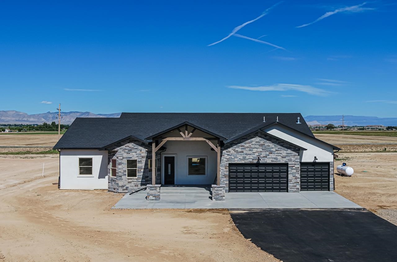 ***Open House Sunday! August 21st from 12:00 PM - 3:00 PM*** Come see Cattlemen's Subdivision, where country elegance & modern day luxury meet. This pristine home is a dream come true. 2,565 sq foot on 1.4 acres surrounded by amazing 360 views and country living at its finest. This new build features vaulted ceilings, wooden beams, split floor plan and more. A true primary bedroom wing with a huge walk-in closet, ensuite and nook. Plenty of room on the large covered patio to entertain and soak in those views from the Bookcliffs and the Mesa. RV parking, horses and more are just few more extras on why you will not want to miss out on this home.