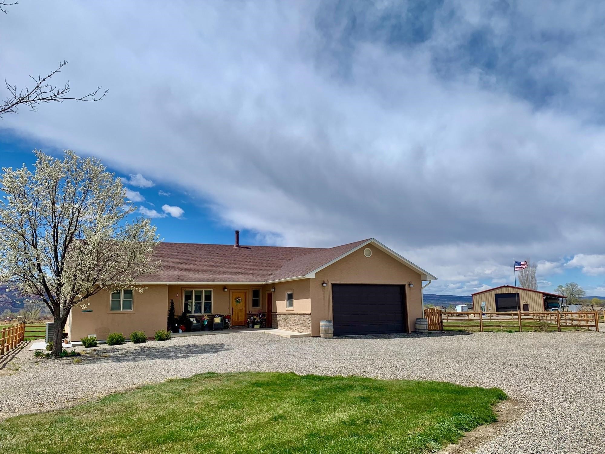 Open concept ranch style home on 9.55 acres with NO HOA!  Approx. 7 acres currently planted in grass pasture. 40x60 heated detached shop with 12x60 RV attached cover, 5 stall 56x26 carport, 2 detached sheds.  Raised garden beds, fully fenced back yard.  Home remodeled in 2018 including paint, flooring, blinds throughout, new appliances, HVAC, fixtures, granite counters, master bath with huge walk in shower.