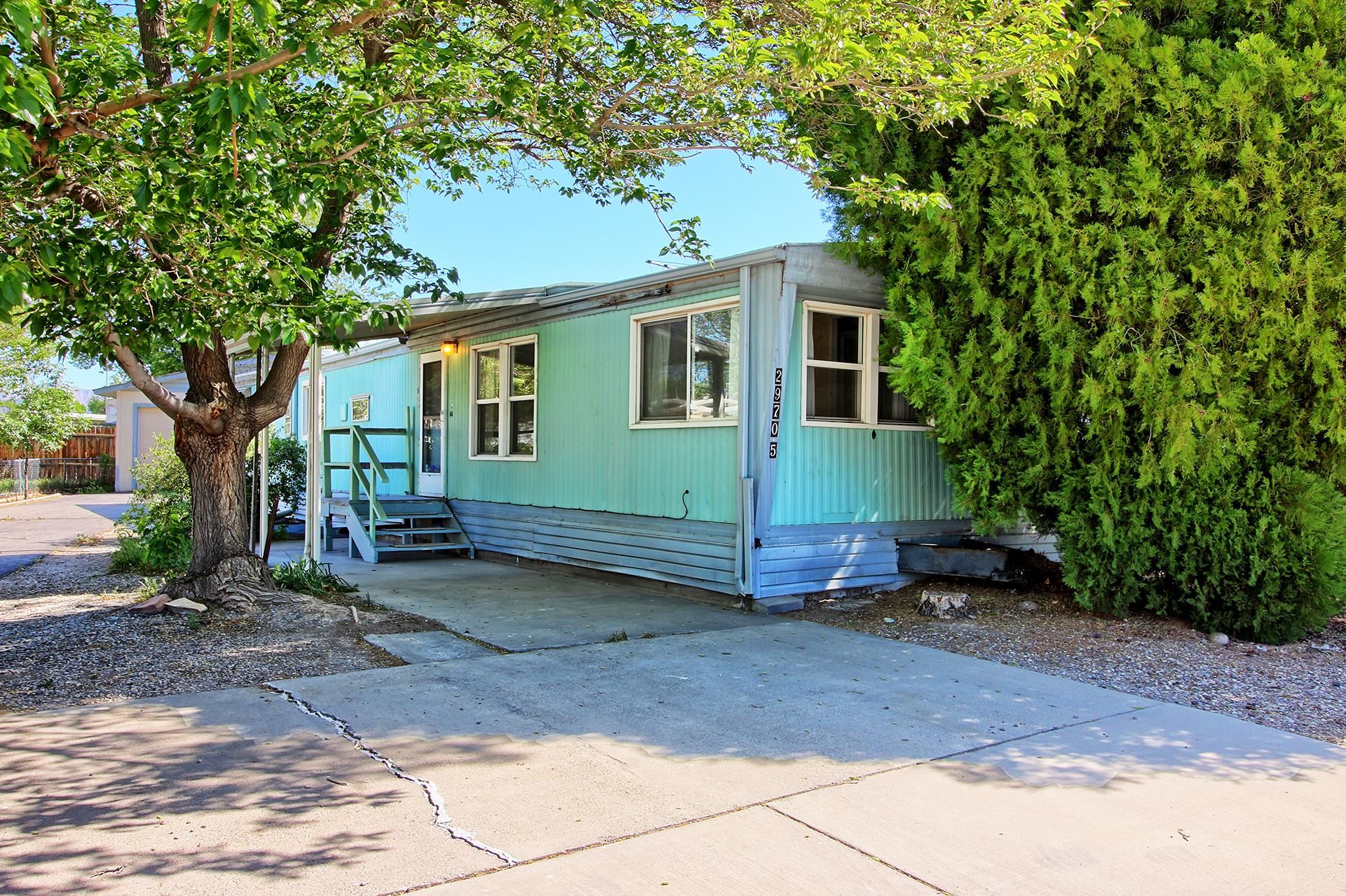 Looking for an affordable home on a large lot? This is it, no lot rent, no HOA, room for RV parking, has irrigation water. Don’t forget about the 24x24 garage or shop of your choice! Home also features 3 bedrooms and 2 bathrooms.