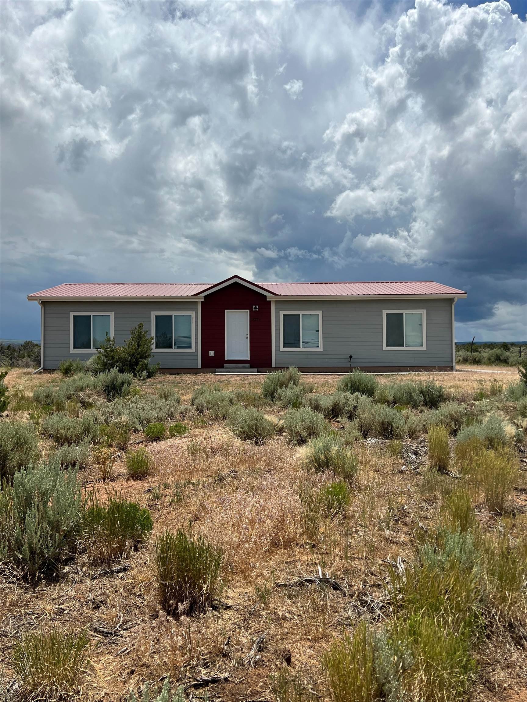 3 Bedroom, 2 bath, 1492 sq ft IRC modular on 35.1 acres on Glade Park!! 360 degree views from this 2016 built home refrigerated forced air A/C. 2 car garage and a truly a nice home with 2x6 walls, upgraded insulation! All kitchen appliances to include a gas range, side by side refrigerator, and dishwasher. You must get inside this home to really appreciate the comfort and quality it has to offer.