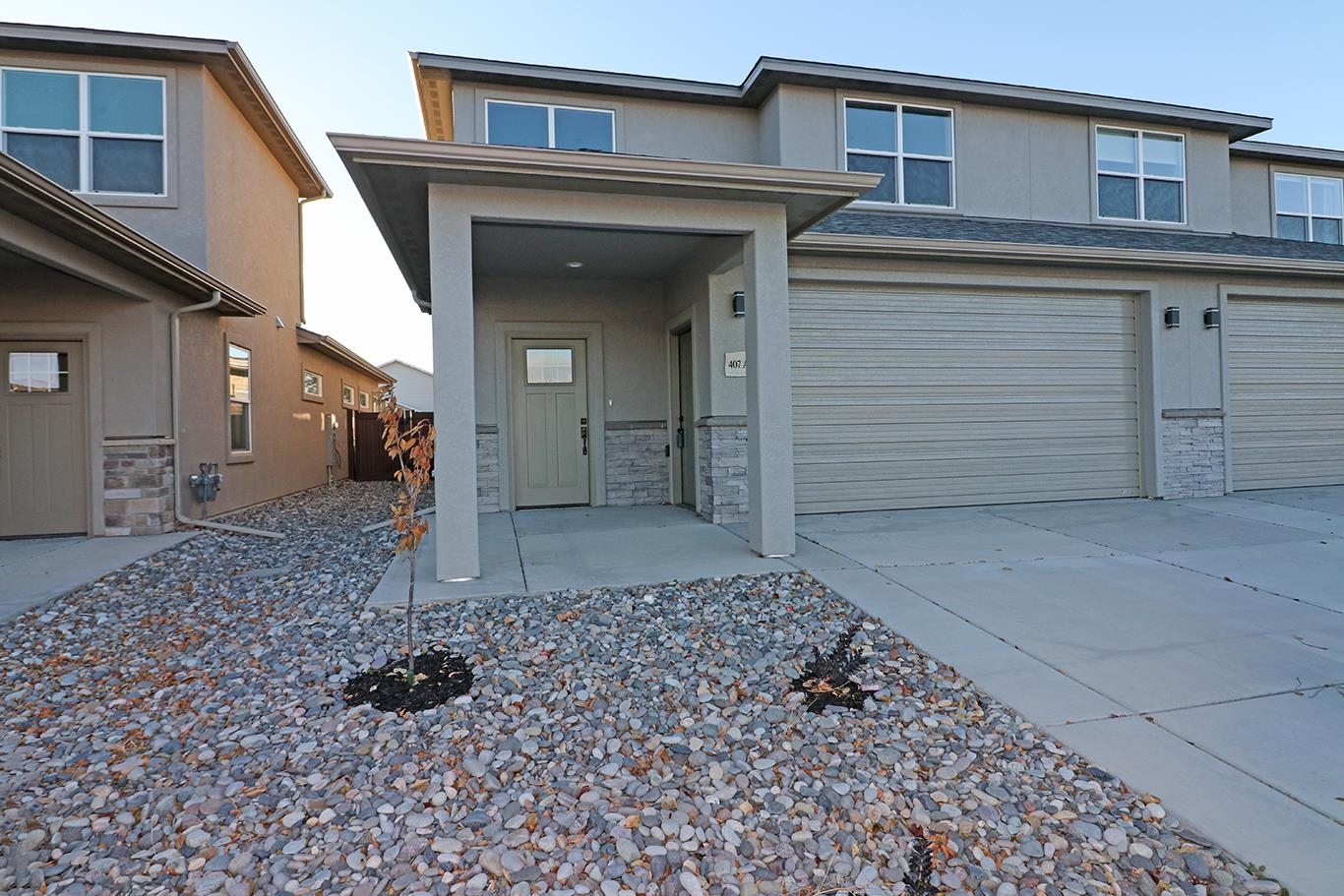 Brand New Townhome by MTB Homes with $8K seller contribution to permanent interest rate buy down and 1% in closing costs through Seller’s preferred lender (call for details).! Master on the main with 2nd living space & 2 addl beds & bath upstairs - rare find in this price range!  Full stainless appliance package, LVT in main level living areas, Granite counters throughout, all showers are tiled (no inserts), glass euro shower door in master bath. Light, bright, spacious home with extra windows, high ceilings, ceiling fans in all bedrooms. Fencing and xericape landscaping w/ domestic water drip system included. Buy adjacent twnhme & live in one while renting the other! Easy access to I-70, Hwy 50 and downtown GJ! HOA only $100/year. Virtual tour is of a similar unit and finishes may be slightly different. Don't wait on interest rates to come down - afford the home you want now using the Builder Advantage Program! Call for details.