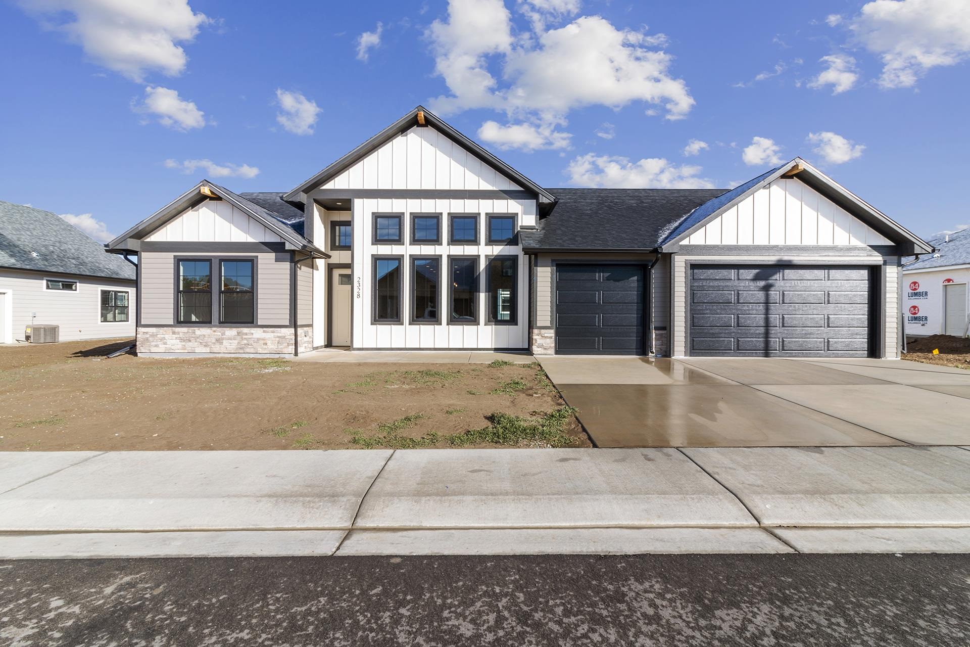 NEW CONSTRUCTION by TreyTyn Homes in Northwest Grand Junction's county-chic subdivision, Silver Spur! This sprawling + functional floorplan has every desirable feature and is sure to WOW! for years to come! A grand front entrance is accented by rows of large picture windows that let plenty of natural sunlight in and create charming curb appeal. The entry leads you into the large open living room with access to three guest/additional bedrooms on the west side of the home. Front bedroom can be used as office/flex space, if desired, and is adjacent to the full bathroom, complete with tile-surround walk-in shower. The two bedrooms on the northwest side of the home share a jack-and-jill bathroom, with dual vanities and tile-surround tub/shower combo. Chef's kitchen offers plenty of upgraded cabinetry, granite countertops, large center island, spacious pantry for plenty of additional storage space and eat-in dining room space -- enjoy the large open space for entertaining guests for years to come! Split-floor plan puts the primary suite secluded on the east side of the home and features a spa-like en-suite bathroom with dual vanities, walk-in shower and private lavatory. Oversized walk-in closet has convenient walk-through access to the laundry room, which can be closed off from the mud room entrance through the garage for additional privacy! Large backyard to enjoy incredible Grand Valley views from the covered patio and plenty of RV parking space! Located in the HIGHLY desired Appleton/Fruita school district and conveniently located near area shopping, restaurants and entertainment! MUST SEE this spectacular property TODAY!