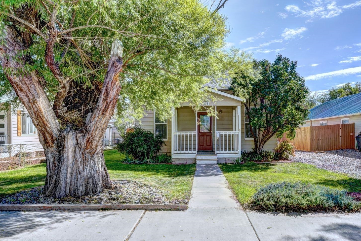Wonderful location in downtown Fruita! Worried about parking, don't be! Plenty of parking with driveway in front, street parking and ample parking + RV parking off the alley. Hop, Skip, Jump, Walk or Ride to all the FUN found in Fruita. Landscape includes mature trees and bushes, blackberries, strawberries and room for a garden. Fully fenced back yard with a great storage shed. Sprinkler system front & back. Sit on your covered front porch, relax and people watch. Built in 1906 home has stood the test of time. 1248 sq.ft. 2 bedrooms on the main level, full bath on the main level (jacuzzi tub). Living, kitchen/dining and laundry on the main level as well. 3rd bedroom ( non-conforming) or office upstairs. With an acceptable offer, Seller is offering a $7,000.00 credit towards roof, closing costs, interest rate buy-down or a combination of those. Home and carpets have been professionally cleaned.