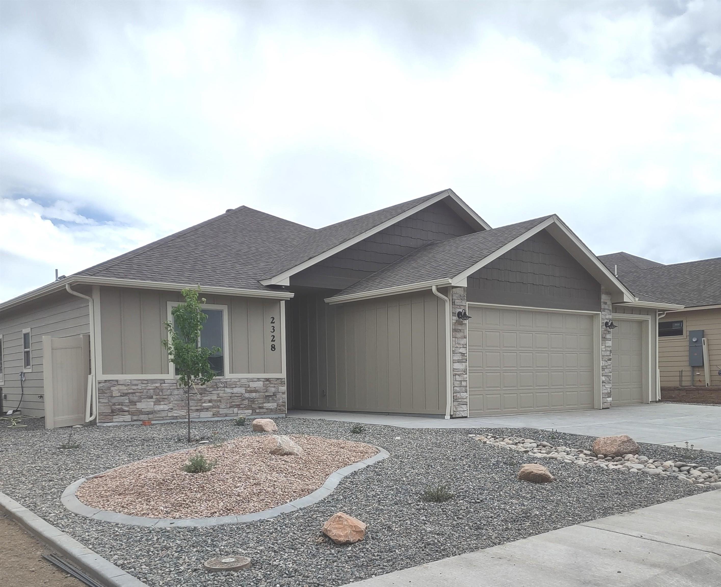 Beautiful new open ranch style 3 bedroom 2 bath home located in appleton.  Comes with stainess steel appliances, ceiling fans, walk in closet in a large primary bedroom with a 5 piece bathroom. enjoy the chef's kitchen with easy close cabinets, under counter lighting, granite counters, gas range, microwave, breakfast bar, connecting to an informal dining room.  living area opens to a covered back patio with ceiling fans for bar-b -que and summer entertaining.  close to shoppong, parks, hopsitals and fun.  Price includes landscaping - call for details. Don't miss out on this  special home that  will give you pride of ownership.  All measurements are approximate.
