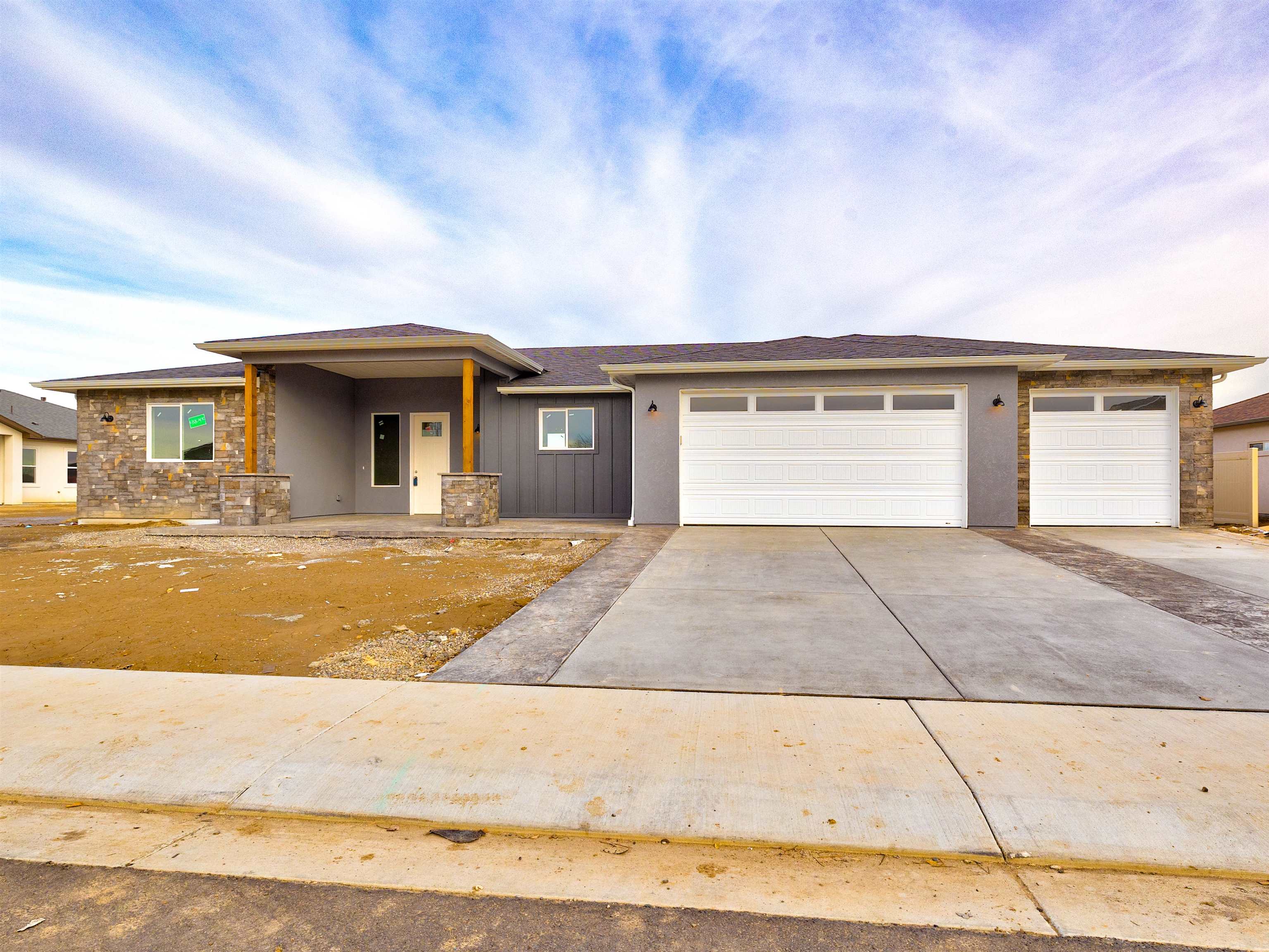 This stunning new build is a MUST SEE! Located in the Orchard Ridge subdivision just minutes from downtown Fruita. This home was planned and constructed with precise plans to create a dynamic, and comforting feel throughout the home. Some features include beautiful granite in the kitchen and bathrooms, a stunning electric fireplace in the living room, designated office space with a closet, and toe kick lighting in the bathrooms. The primary bedroom has a retreat feel and you will appreciate the spilt bedroom floor plan. Outdoor features include stamped concrete on porch and patio and is used in landscaping. Plenty of room for RV parking.