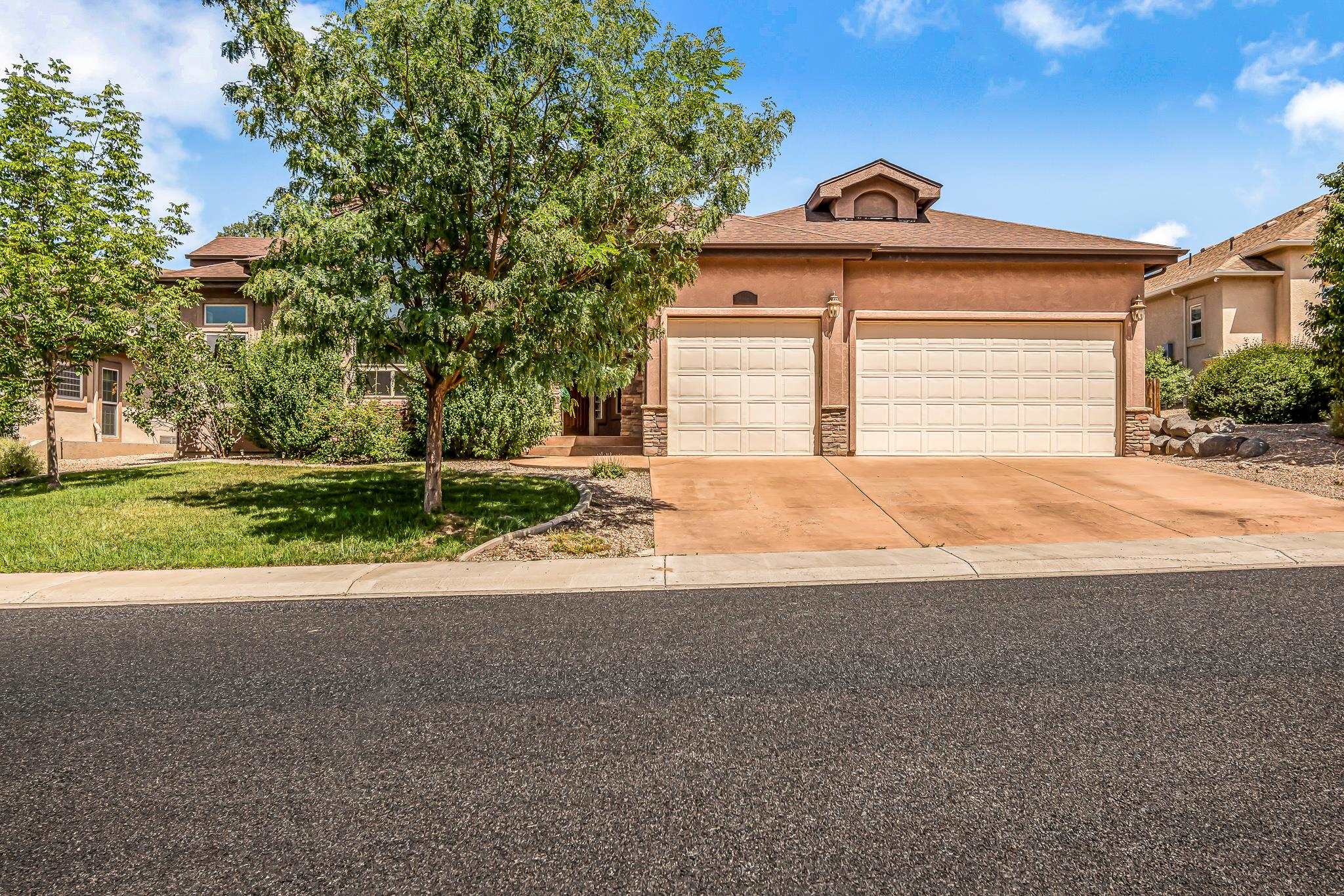 This traditional single level home is located in the esteemed Renaissance subdivision. much larger than the pictures appear, look at the 3d Tour or schedule your showing today.  Only 2 miles from the Tiara Rado golf course and 3 miles from the Colorado National Monument, the location cannot be beat. The abundant outdoor amenities close by are within minutes in every direction. When you enter through the covered front, you are greeted by the grand entryway with custom tile work and arches leading you to the rest of the 3,069 square feet this huge home boasts. The master suite is tucked in its own corner of the home for true privacy in this luxury space and a separate exit to the back patio that was created to entertain! Huge walk in closet, extra storage, 5-piece bath including a large jacuzzi tub and built-in vanity, tops off this full service suite. One of the additional guest bedrooms is set up with a private 4-piece bathroom and a dual facing fireplace shared with one of the 2 family rooms. The second family room has a gas fireplace as well! There is an additional bonus/flex space that can be used as an office, formal dining or whatever you need. Every single bedroom in this home has its own attached bathroom and the back bedroom has a private exit to the patio. The kitchen has a Granite bar top, 5 burner gas range oven and dedicated dining area. The large laundry room makes a truly functional space and leads you into the huge 3 car garage! Plumbed and ready to add a central vac system, built in wall mounted water feature and gas plumbed to the back patio for your outdoor cooking, are only a few of the additional features that this Renaissance home has to offer. Are you ready to settle into an exclusive neighborhood and enjoy the lifestyle it brings? Schedule your showing for this Redlands property today!