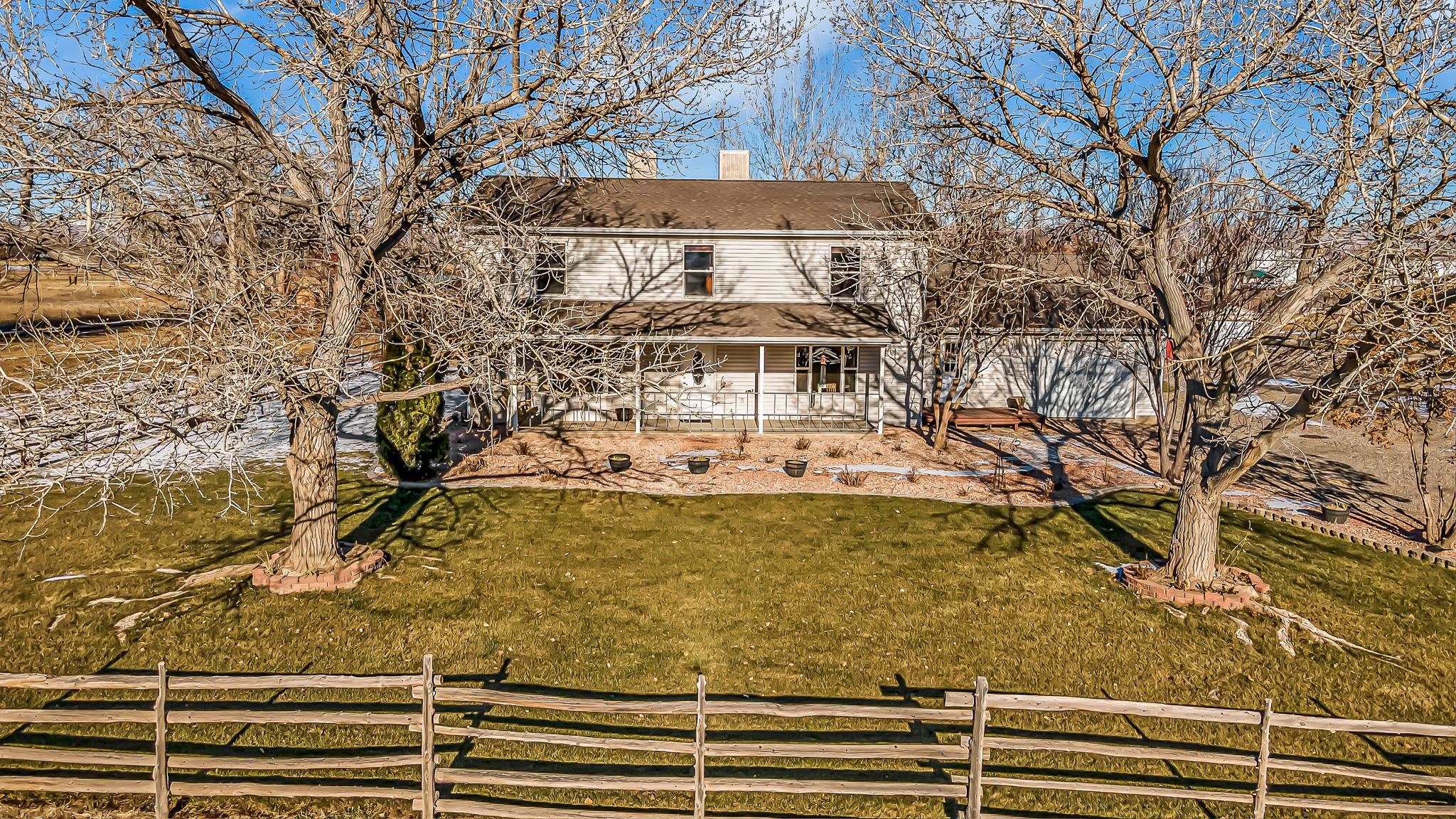 Great work/live setup! This property is located in the desired city of Fruita and sits along the high visibility and direct access from Highway 6&50. This includes a remodeled (2021) 2,964 square foot home that will be fully furnished if buyer chooses.  The home includes 6 bedrooms with master bedroom on the main-level, 2 ¾ bathrooms, living room, mud room, large kitchen, dining room, 14’ X 24’ attached garage, large covered front porch with beautiful views, large back patio, and two detached sheds. The property includes 4 shares of water rights. There is an option to purchase a pressurized irrigation system that includes a center pivot and pump house. As an added bonus the property has 8 RV hookups! The property includes a remodeled (2021) 40’ X 60’ warehouse that has two automatic 14’ overhead doors. The interior has a built in parts counter, nicely finished concrete floors, partial corrugated metal walls, wide open space for retail, nicely updated bathroom, conference room, office, and covered back storage. As an additional bonus, the warehouse is insulated, heated, and air conditioned!