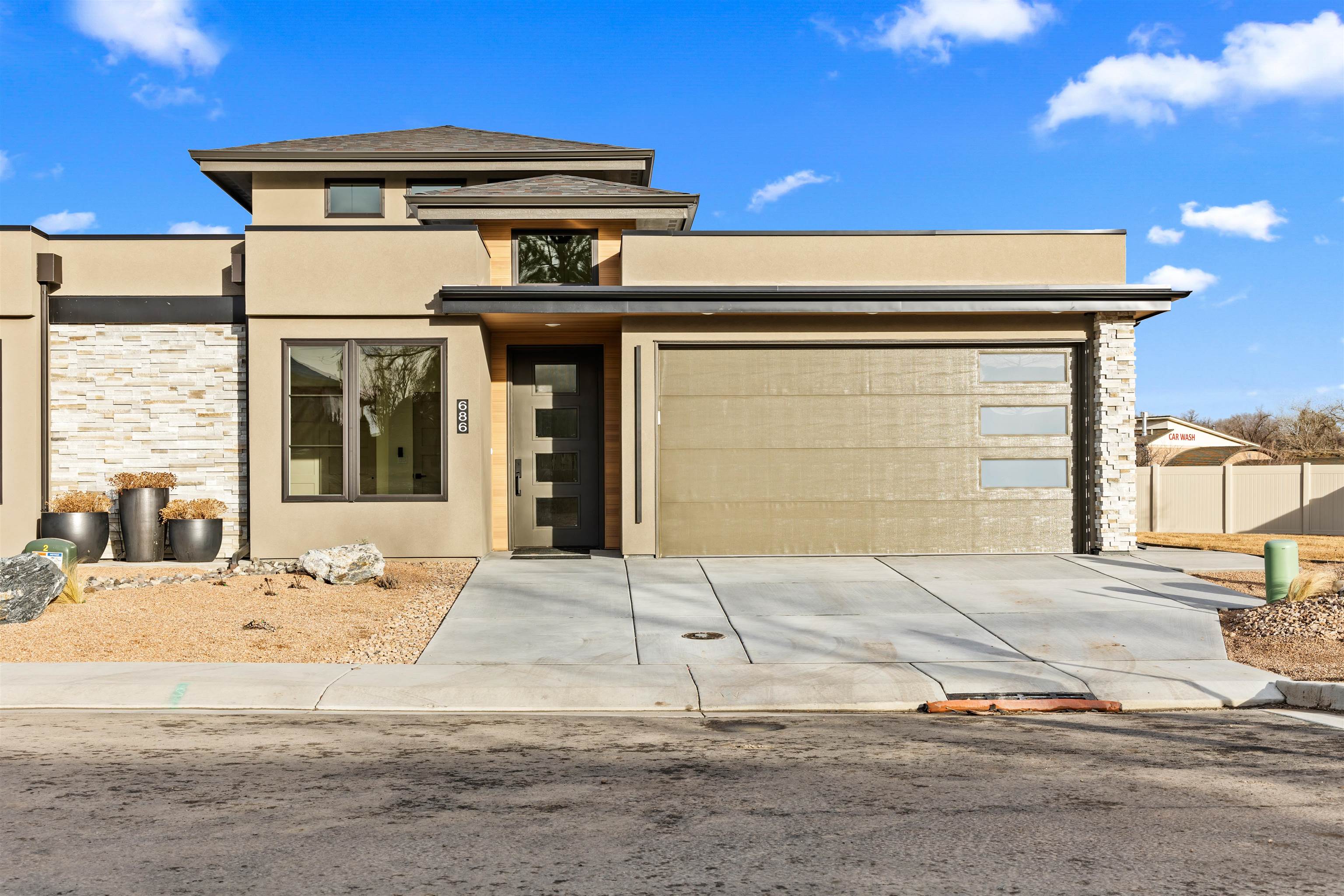 Brand New 3 Bedroom, 3 Bathroom Single Family attached home! Great North Grand Junction location near Bookcliff Country Club, St. Mary's Hospital, I-70, GJ Airport, and Colorado Mesa University. Professionally designed and built. Stairless main level - real wood floor *some options may apply*. Upper level area consists of a flex-room, full bath, 3rd bedroom (option family room), and a covered patio with beautiful views. Custom features throughout, including: gas/electric cooktop options, beverage cooler, outdoor grill gas hookup, EV charger set up, appliance options, etc. Limited 17-lots, platted for new private modern townhomes. Options for single family unattached and attached. Ranging from 1,715 - 2,569 sq ft.   Go check out the QR code for more information! All showings are by appointment only, as we are in different stages of construction.  Directions: Between 12th Street and Horizon Drive, South Side of G Road, turn South on Westcliff Drive.