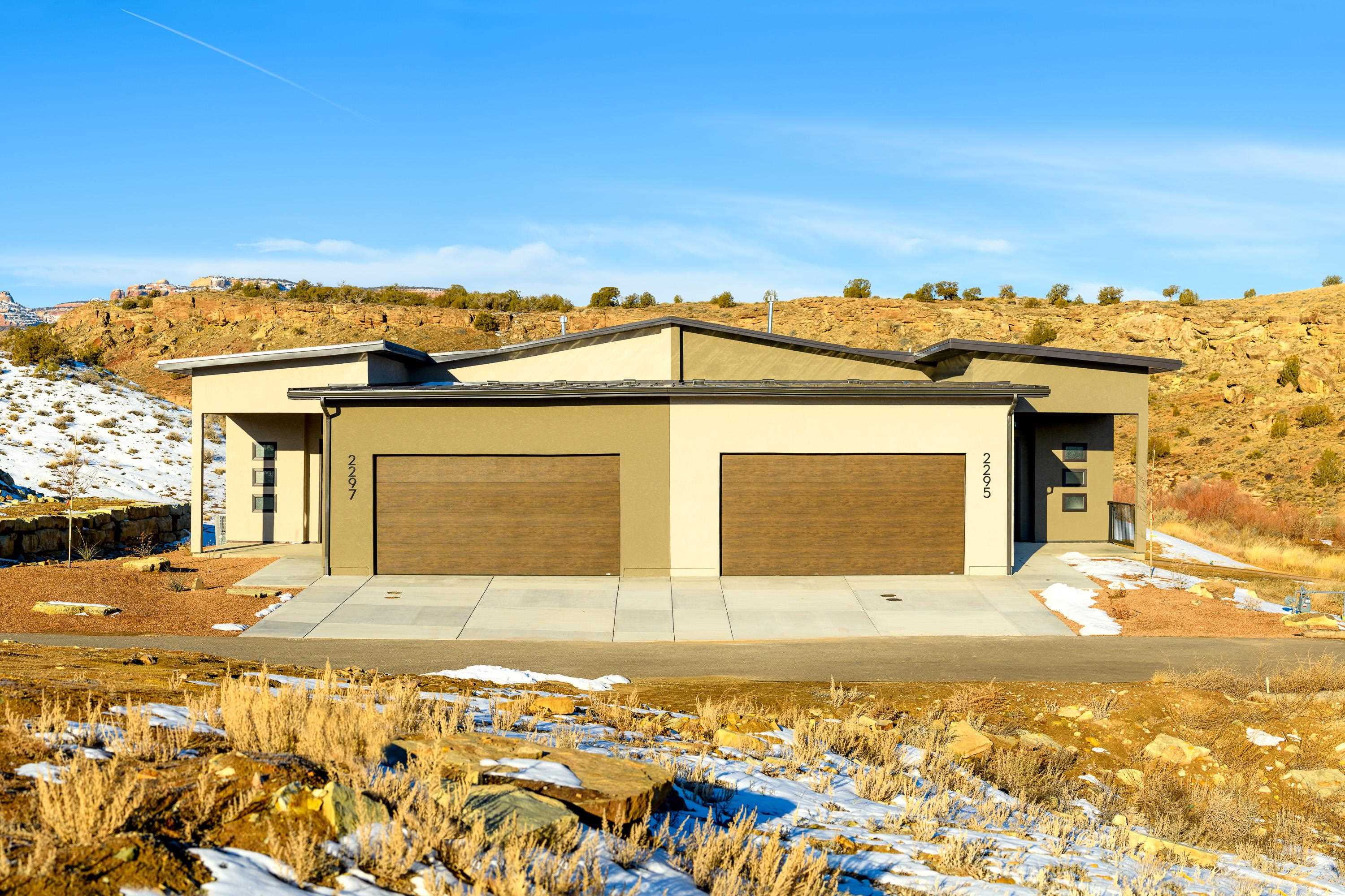 Here is a fantastic investment opportunity at the highly desirable, award winning Redlands Mesa Golf Course!  These brand-new construction townhomes have tons of options, including Air BNB and VRBO rental capabilities or why not live in one and rent the other?  With spectacular views of holes #11 and #12, these lock-and-leave, low-maintenance units also have easy cart path access to the golf course and clubhouse.  Inside each quality-built townhome you will find an open concept layout with a large kitchen, 3 spacious bedrooms, 3 bathrooms, 3 separate living areas, a gorgeous patio and an oversized 2-car garage.  Located a few minutes from downtown and just steps from hiking and mountain biking, you won’t want to miss this.  These 2 units are available for purchase together or can also be sold separately.  Call us for your private showing today!