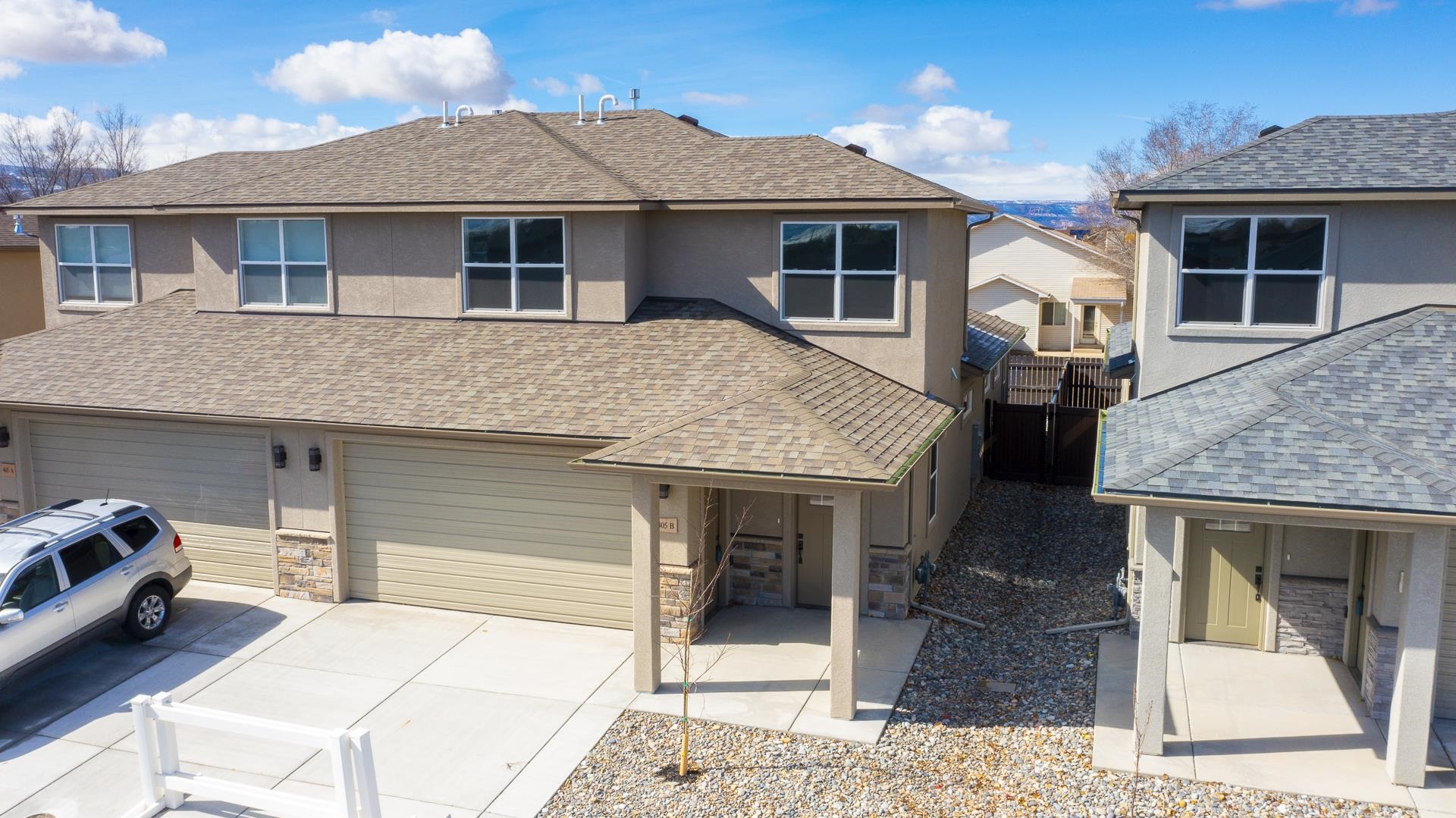 Brand New Townhome by MTB Homes with 1% in closing costs through Seller’s preferred lender (call for details).! Master on the main with 2nd living space & 2 addl beds & bath upstairs - rare find in this price range! Full stainless appliance package, LVT in main level living areas, Granite counters throughout, all showers are tiled (no inserts), glass euro shower door in master bath. Light, bright, spacious home with extra windows, high ceilings, ceiling fans in all bedrooms. Fencing and xeriscape landscaping included w/ domestic water drip system. Buy twnhme next door & live in one while renting the other! Easy access to I-70, Hwy 50 and downtown GJ! HOA only $100/year. Virtual staged pictures are of a similar floor plan. Call now to find out how the Builder Advantage Program can save you 1% in closing costs! Call for details.