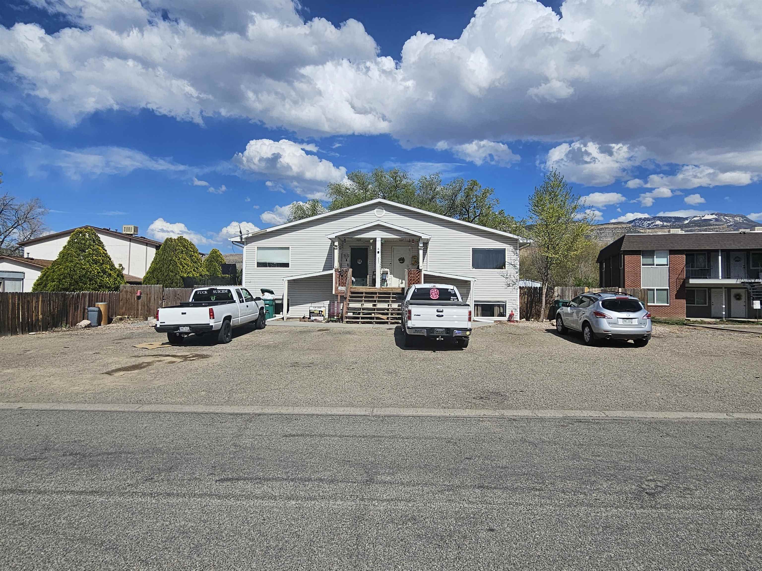 This is a GREAT opportunity for you to own a fourplex in Palisade. Fully occupied property with great rental history. Each unit has 3 nice size bedrooms  &  1  1/2 baths and access to the yard.  Great location within walking distance to River Bend Park, Colorado River Front Trail and beautiful downtown Palisade.  Backs up to Taylor elementary for open feeling and great views of Grand Mesa.  Metal sheds included at property.  24 hour notice required to show.  All units are occupied.   Photos provided of unit D were when the property was vacant.