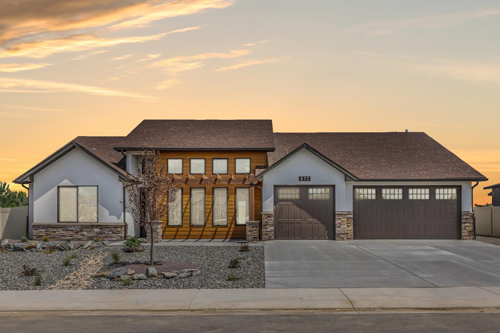 An abundance of adjectives will pop into your head when you explore Dahl Built Homes latest new build - "Ordinary" isn't one of them! This AMAZING home is in Fruita’s, Orchard Ridge community. The exterior is a blend of farmhouse and traditional elements. Inside, the main area presents plenty of natural light coupled with the 10' ceiling in the kitchen and 14' ceiling in the living room. The master bedroom is spacious, and the master closet is connected to the laundry room creating a convenient layout. The secondary bedrooms feature a J & J bath and a separate bath for the 4th bedroom adding a level of privacy. The outside offers RV parking and backyard has great patio space with custom fire pit built for entertaining. Come see what all the excitement is about!