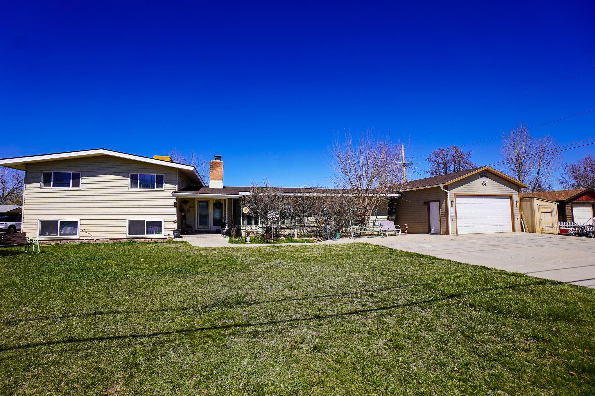 Welcome to Fruita! This home has so much to offer, the possibilities are endless. Less than a 10-minute walk to downtown Fruita. Room for everyone in this beautiful home. Enjoy your summer evenings in your huge backyard with a swimming pool and room to run and play. Amazing views of the Monument from the front yard. Did I mention NO HOA. Oversized 2 car garage/shop with 220. Plenty of storage for all your stuff. Come check it out before it's gone.